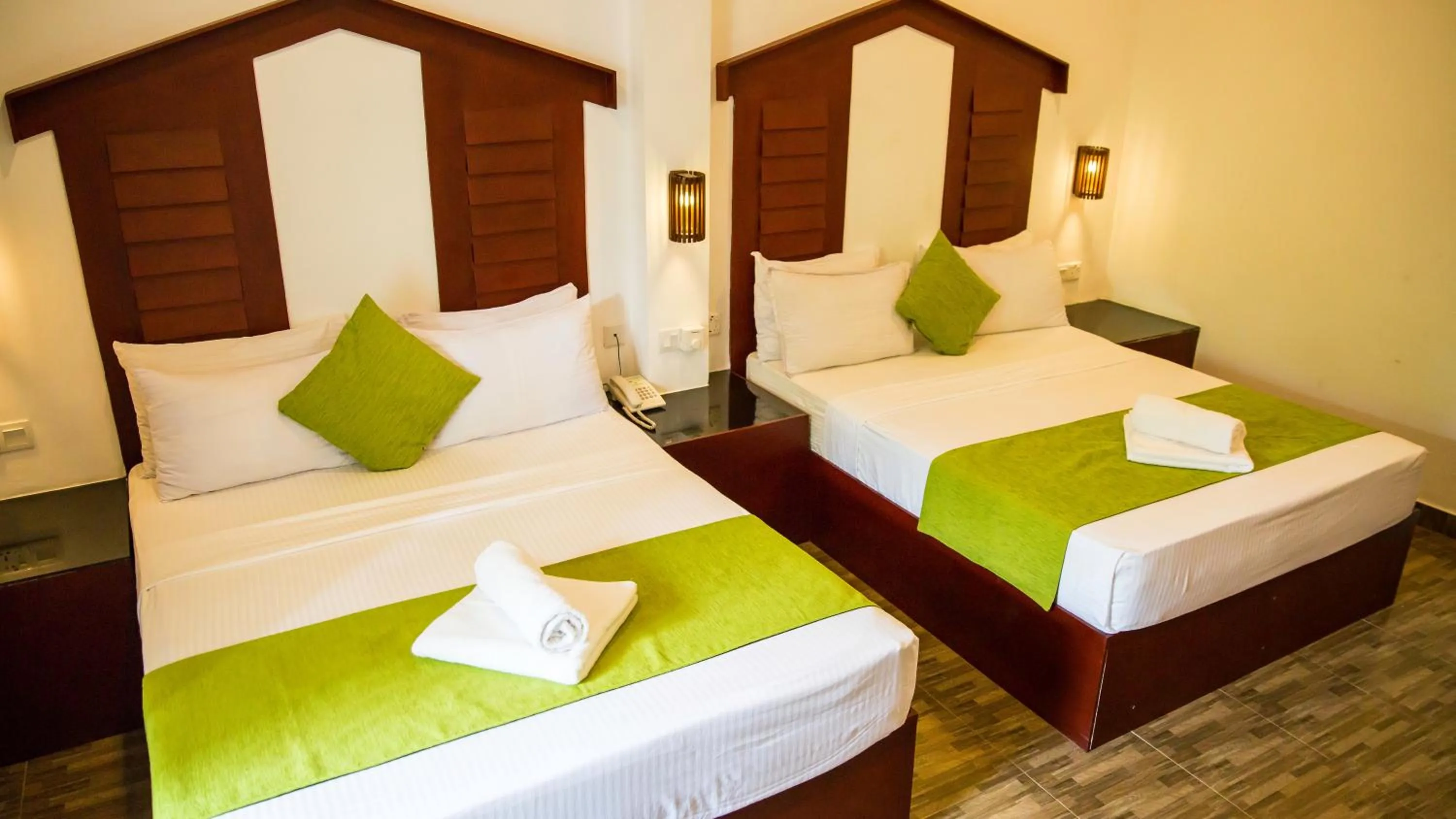 Bed in Sunshine Resort & Spa Sigiriya