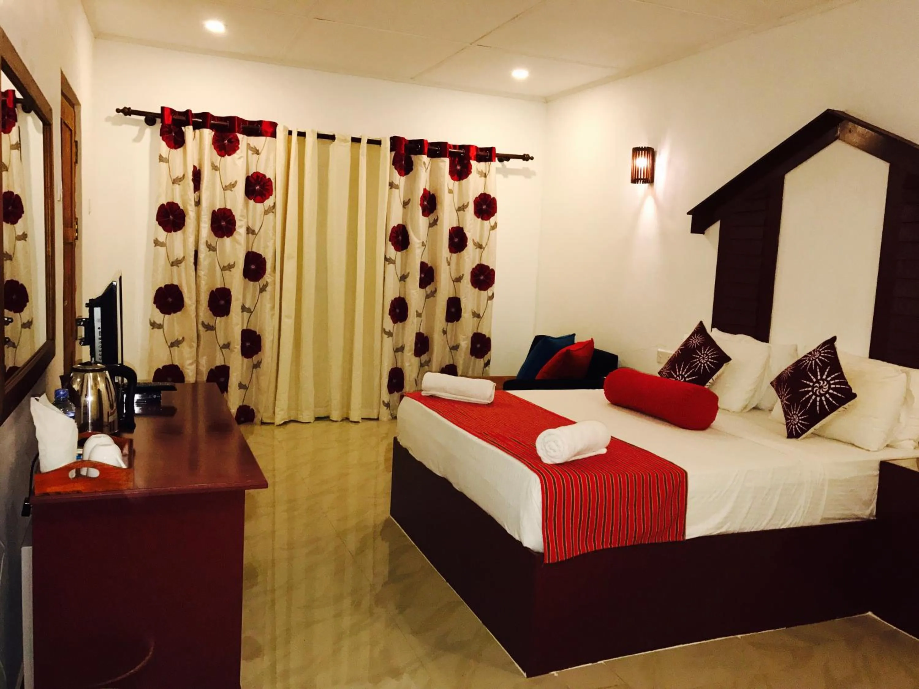 Bed in Sunshine Resort & Spa Sigiriya