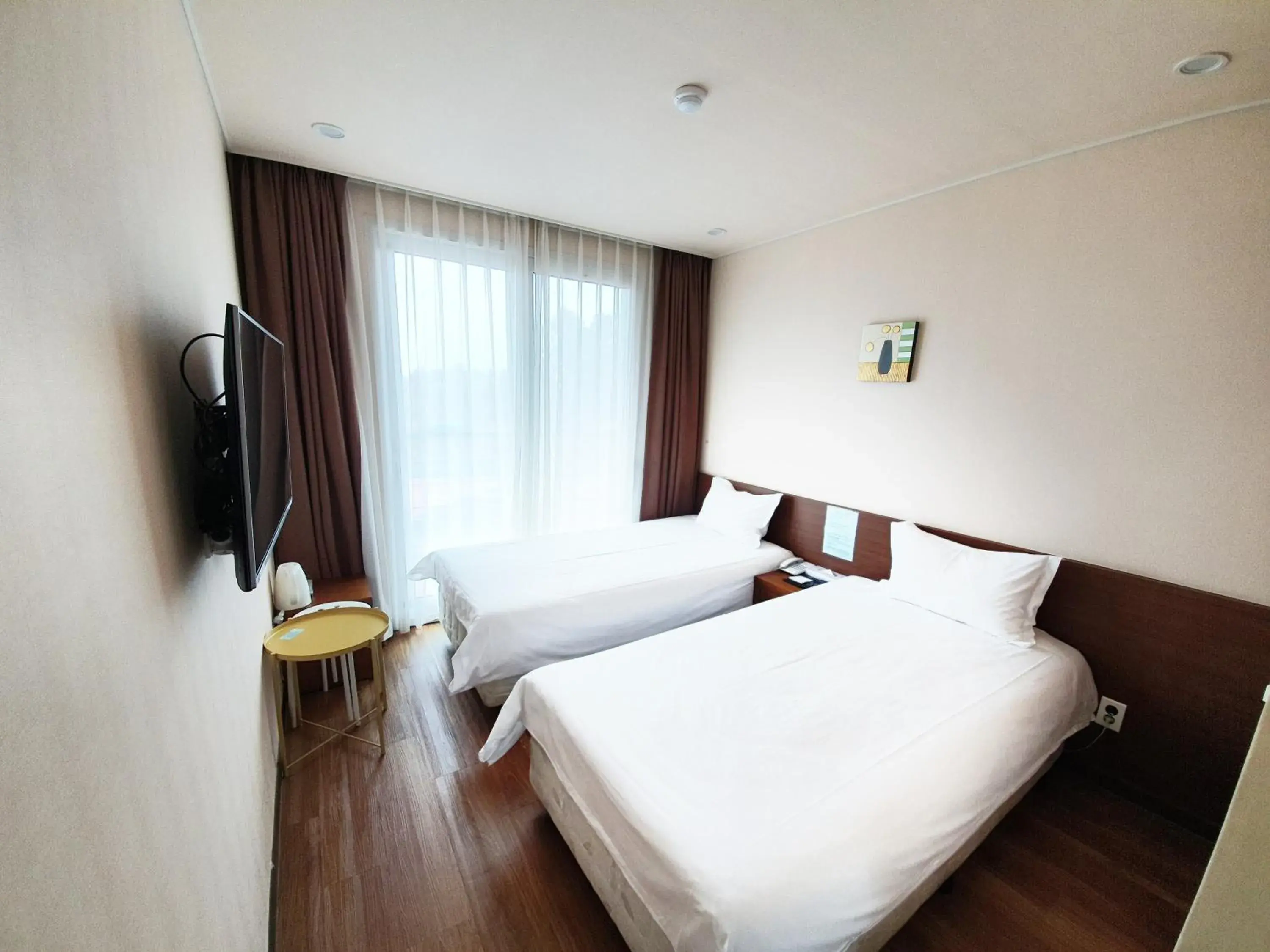 Bed in Jeju Jungmun Ocean Blue Hotel Bed in Jeju Jungmun Ocean Blue Hotel