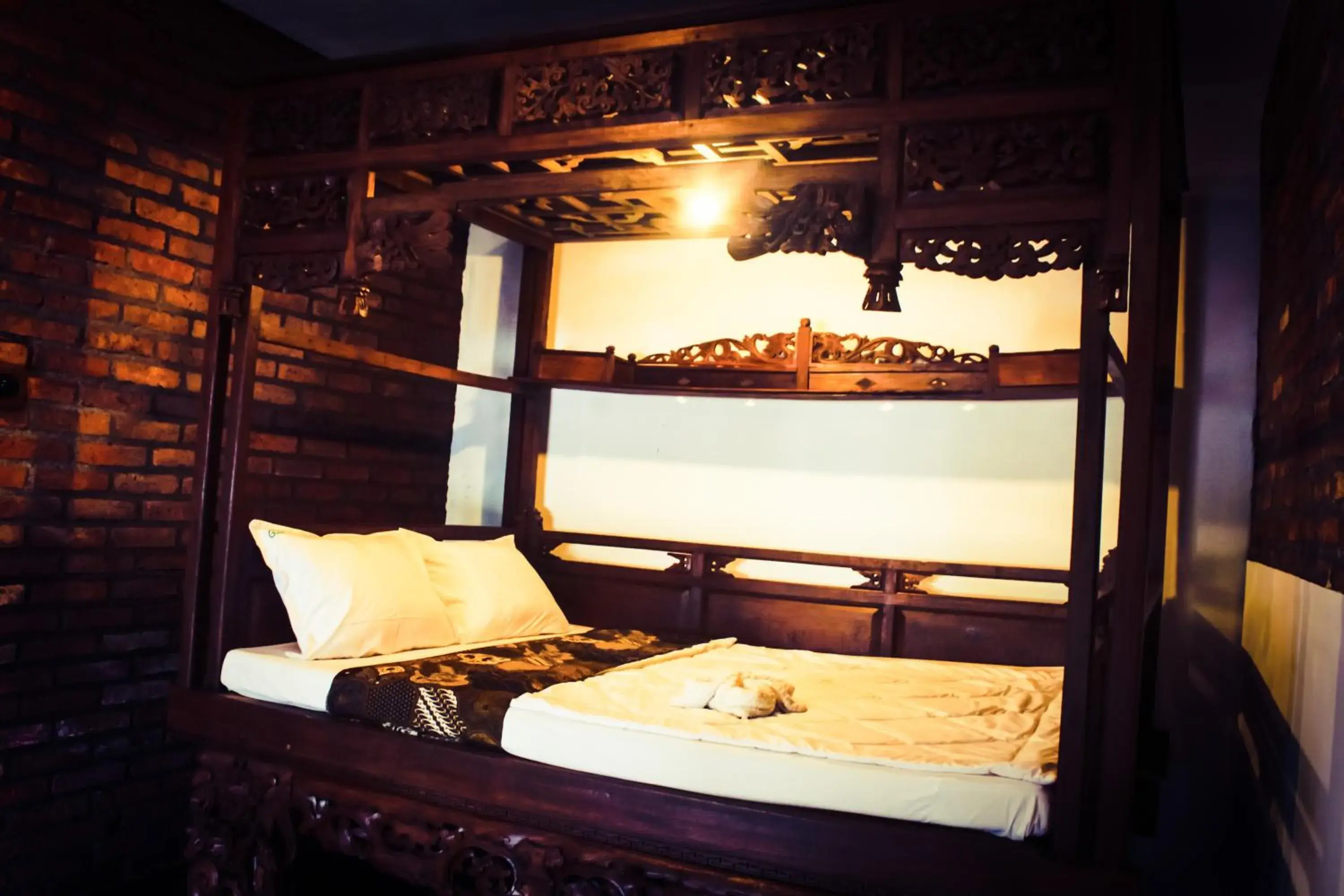 bunk bed in Griya Gribig Guest House Mitra RedDoorz bunk bed in Griya Gribig Guest House Mitra RedDoorz