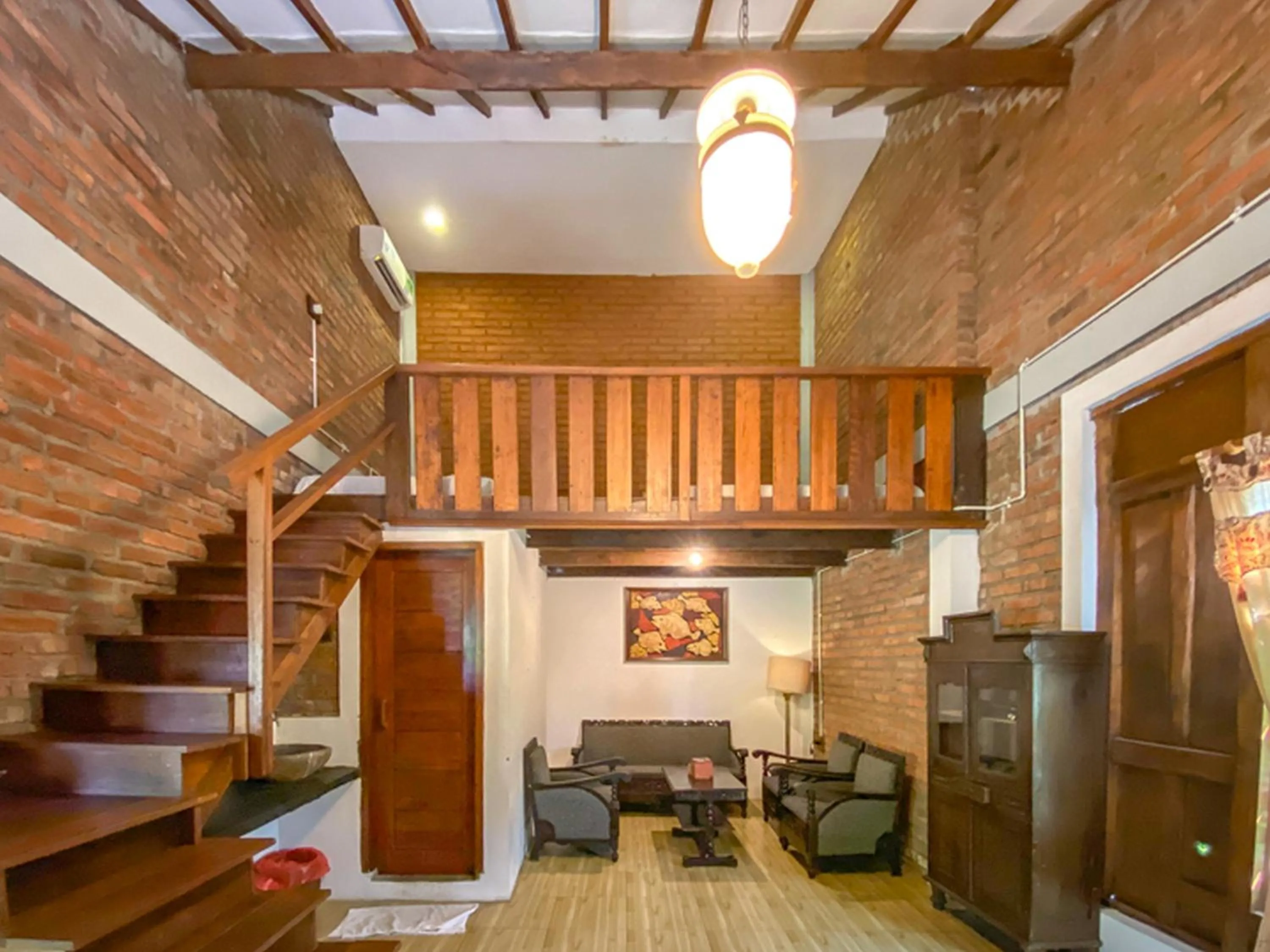 Living room in Griya Gribig Guest House Mitra RedDoorz