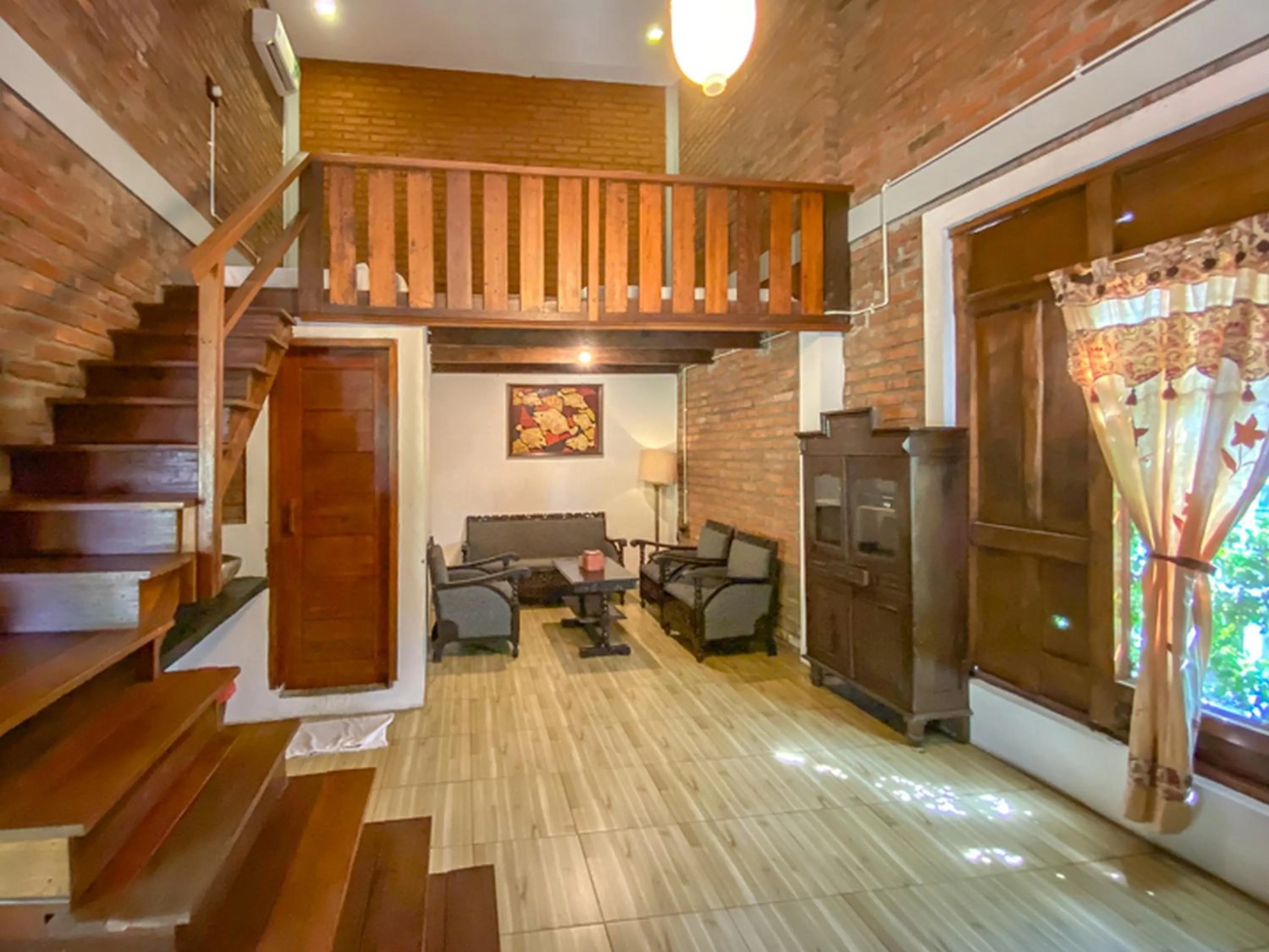 Living room in Griya Gribig Guest House Mitra RedDoorz