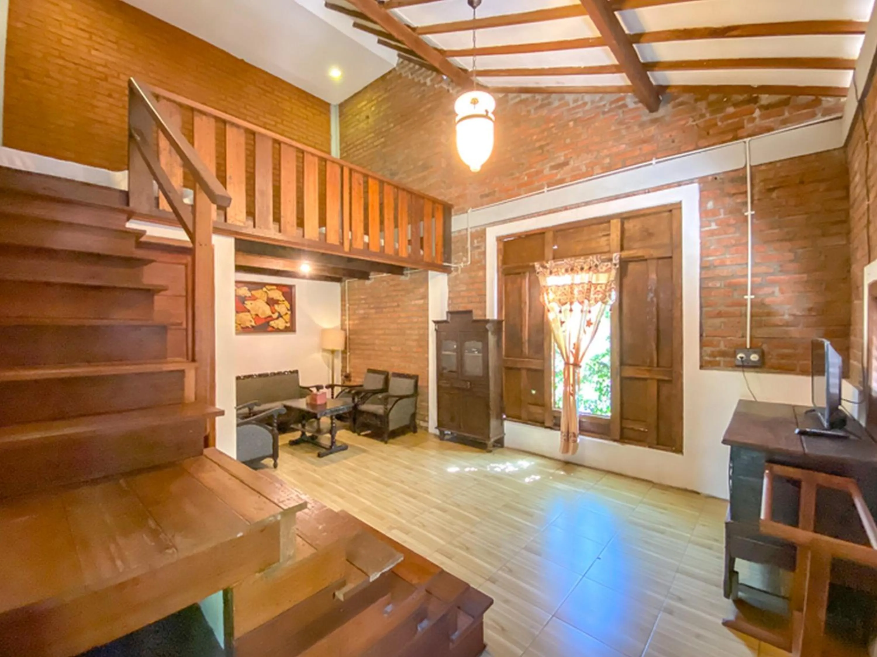 Living room in Griya Gribig Guest House Mitra RedDoorz