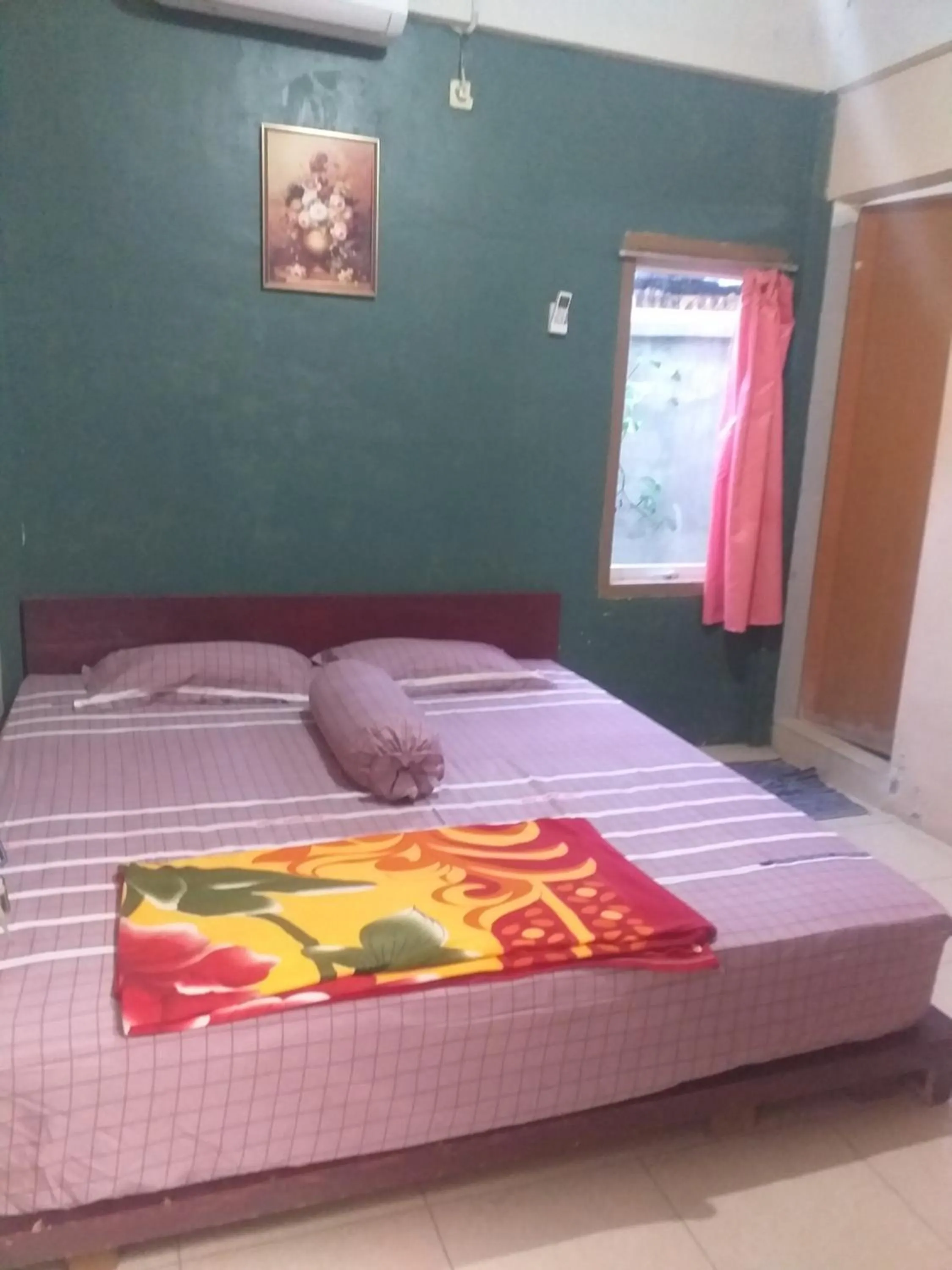 Bed in Kenangan Guest House