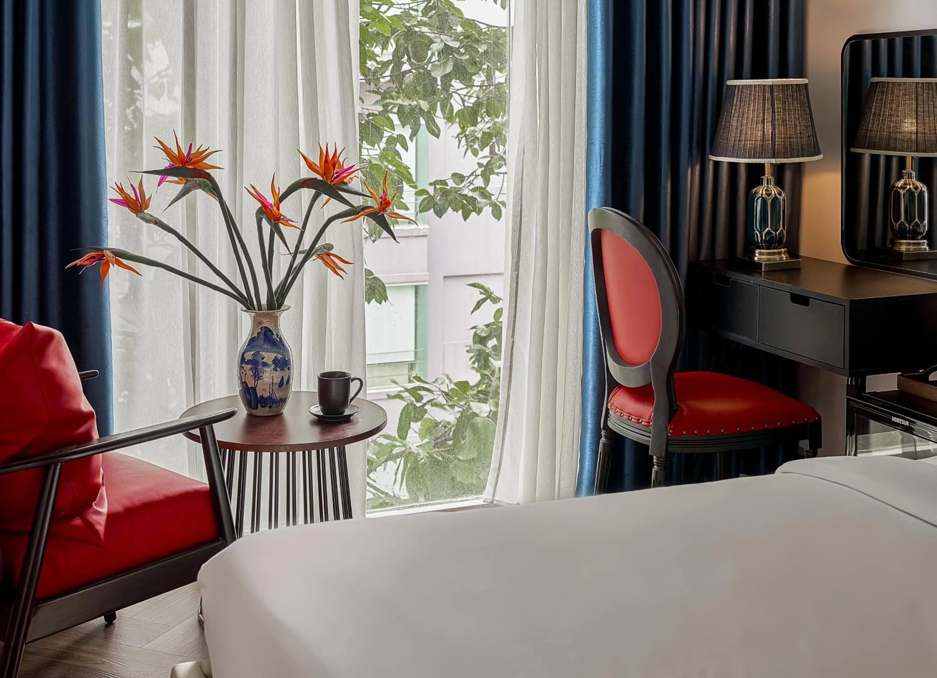 Seating area, Bed in The Passion Suites Hotel & Spa