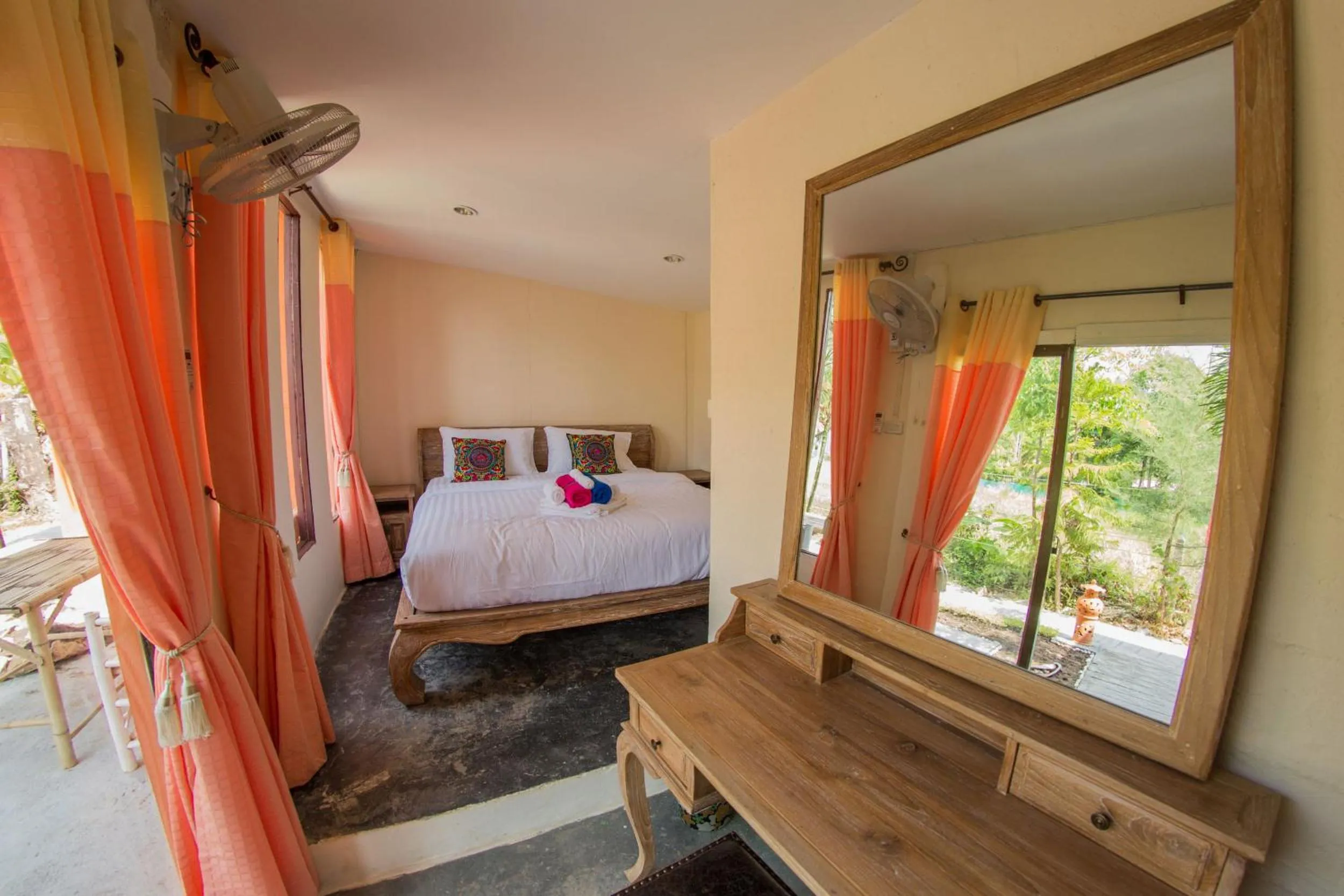 Bed in El Greco Bungalows Koh Lanta