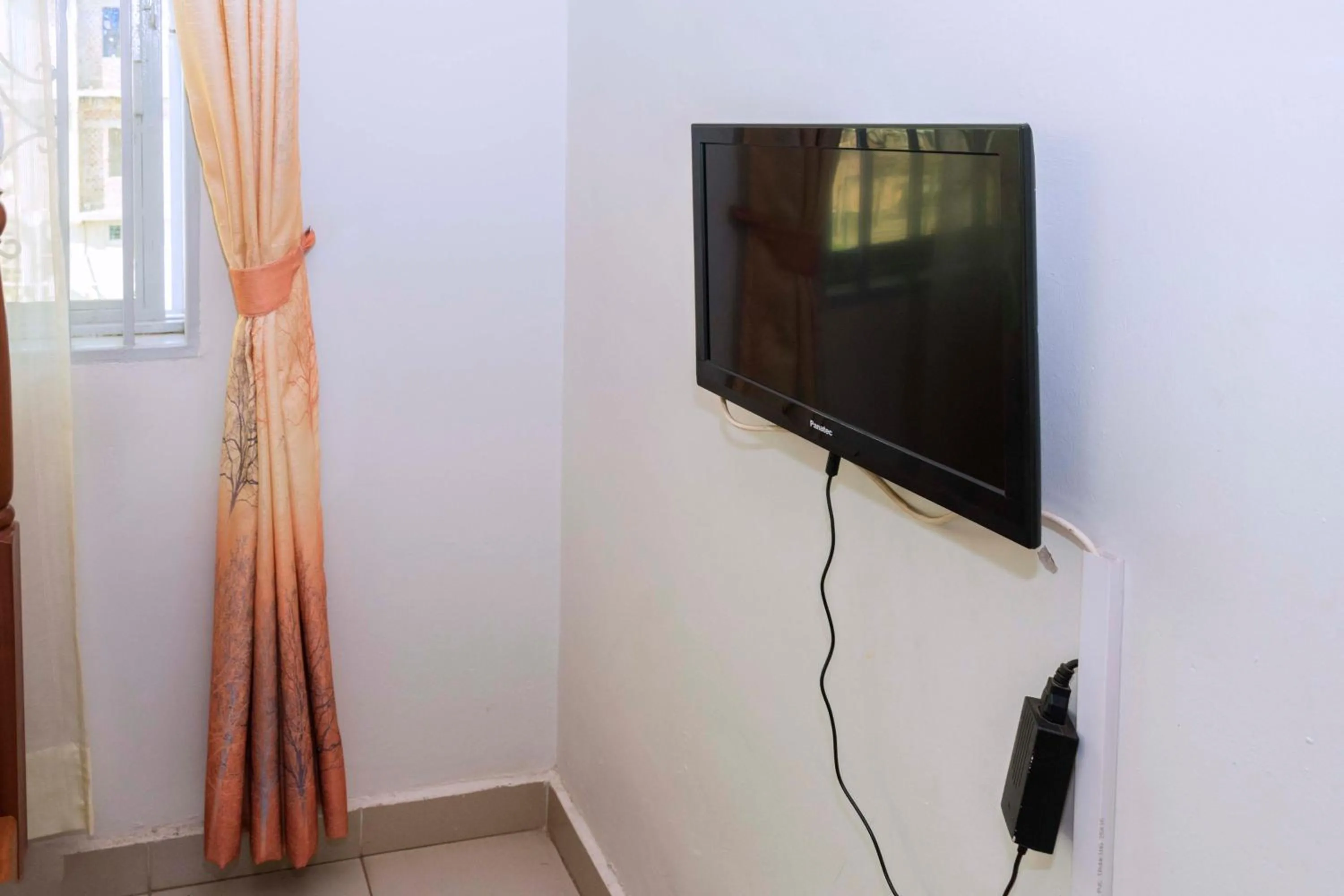 TV and multimedia in Relief Motel Fort Portal