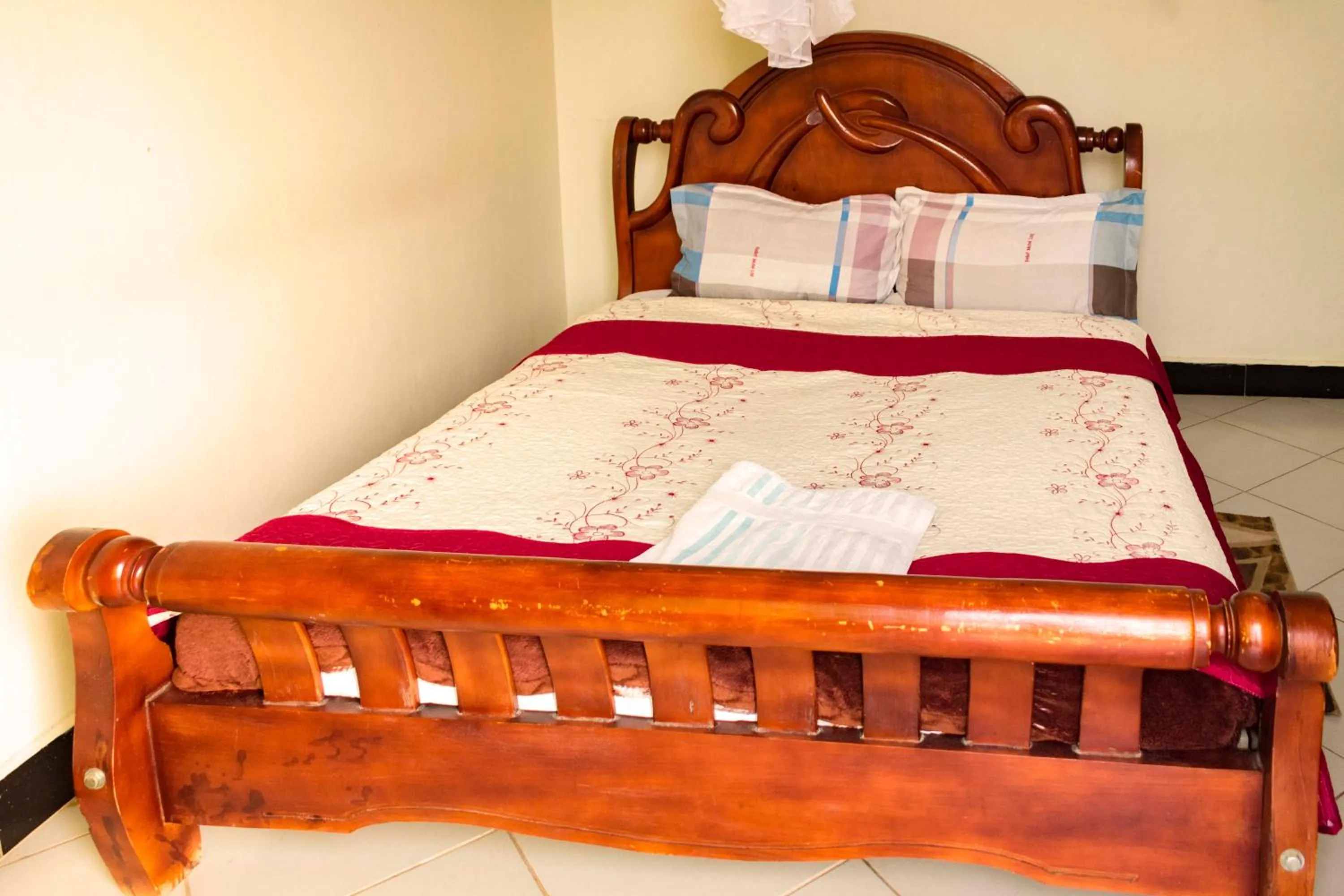 Bed in Relief Motel Fort Portal