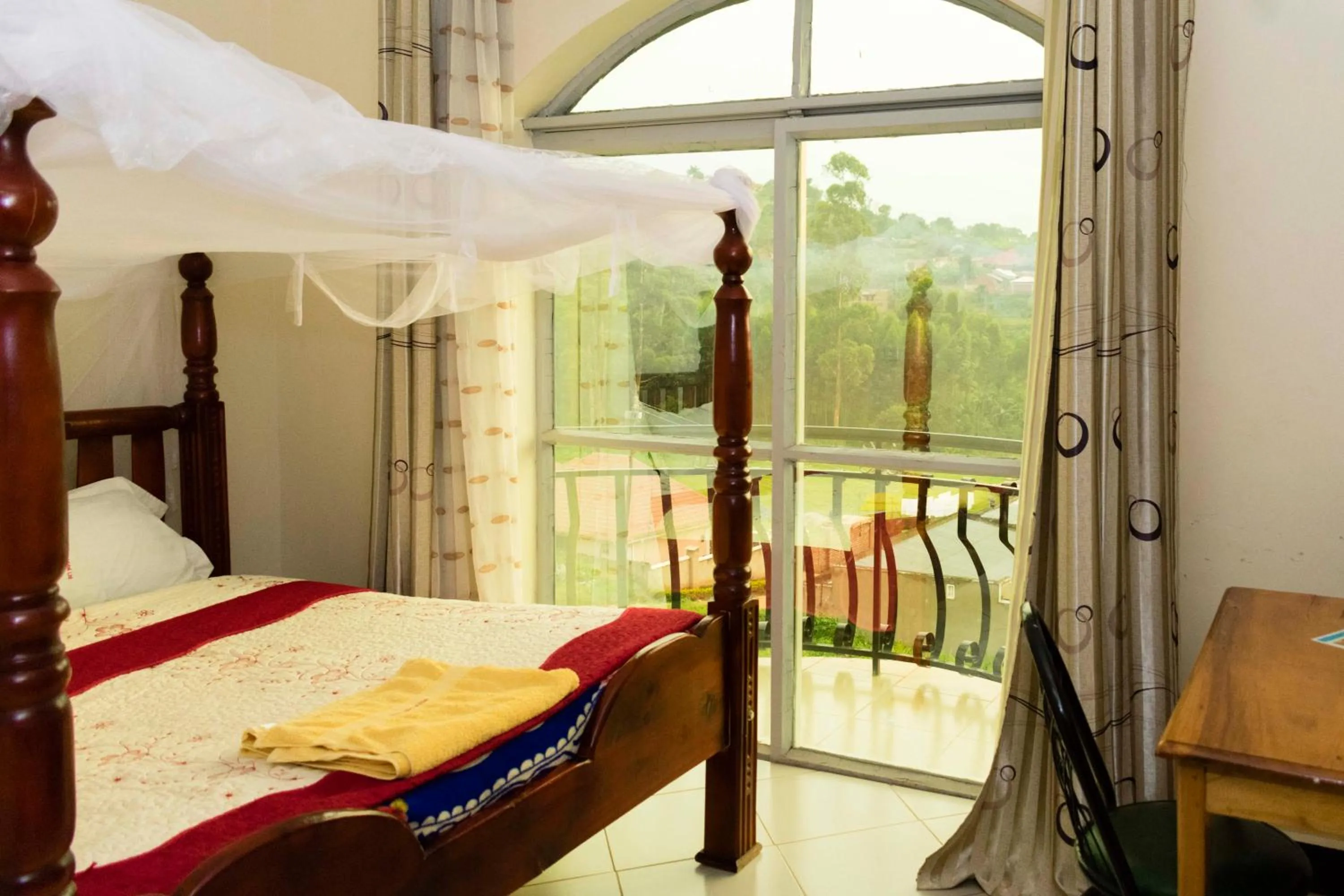 Bed in Relief Motel Fort Portal