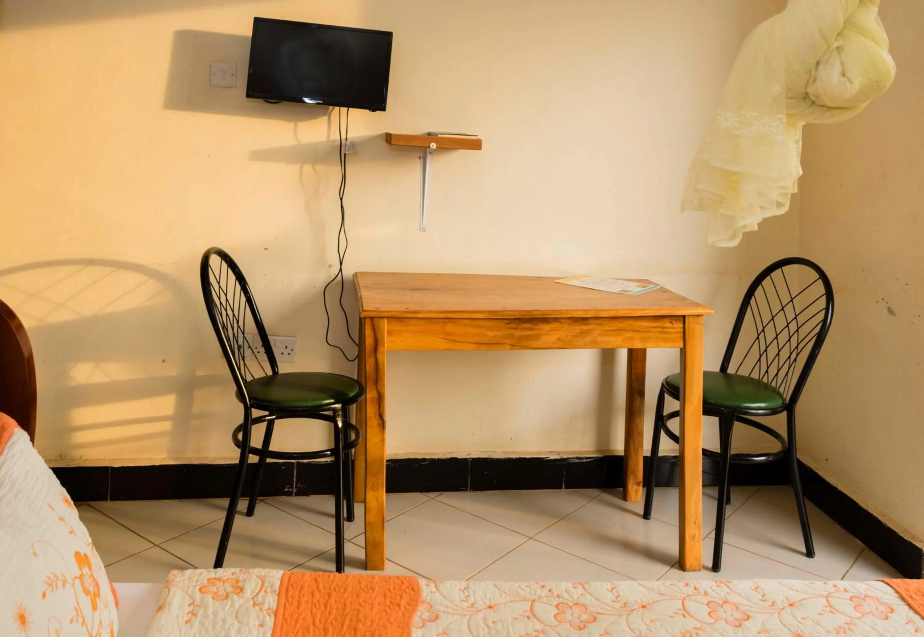 Communal lounge/ TV room in Relief Motel Fort Portal