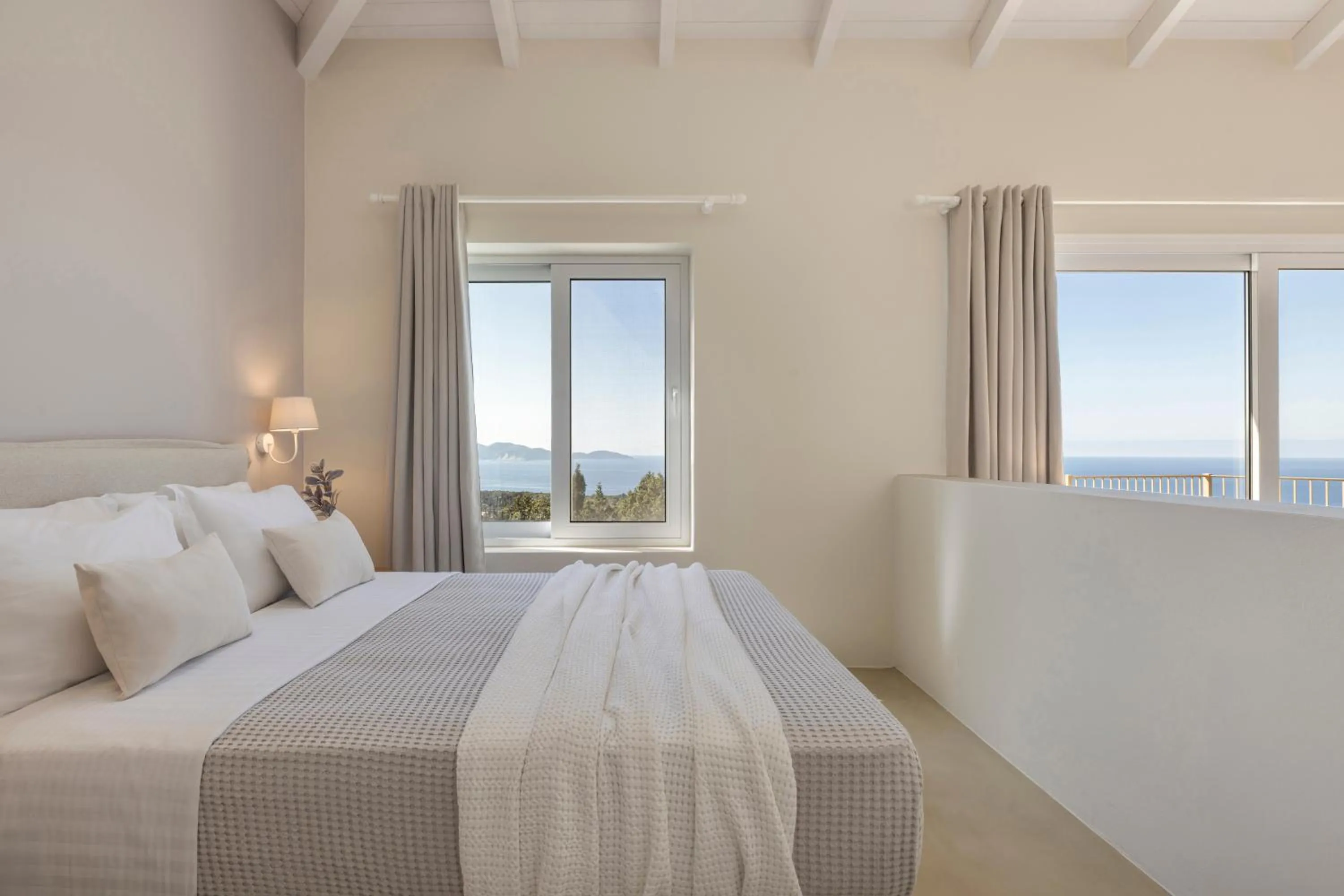 Bed in Magganos Sunset Villas