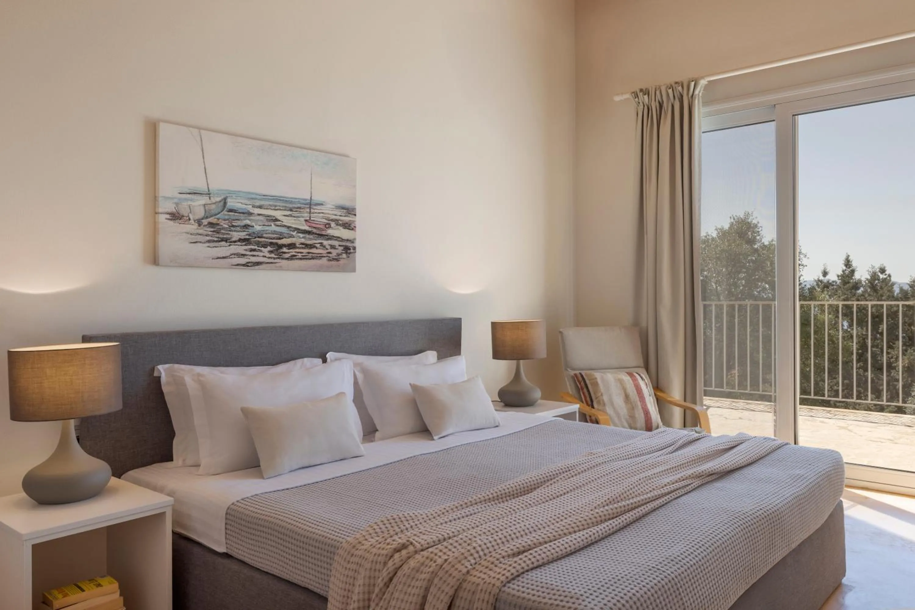 Bed in Magganos Sunset Villas