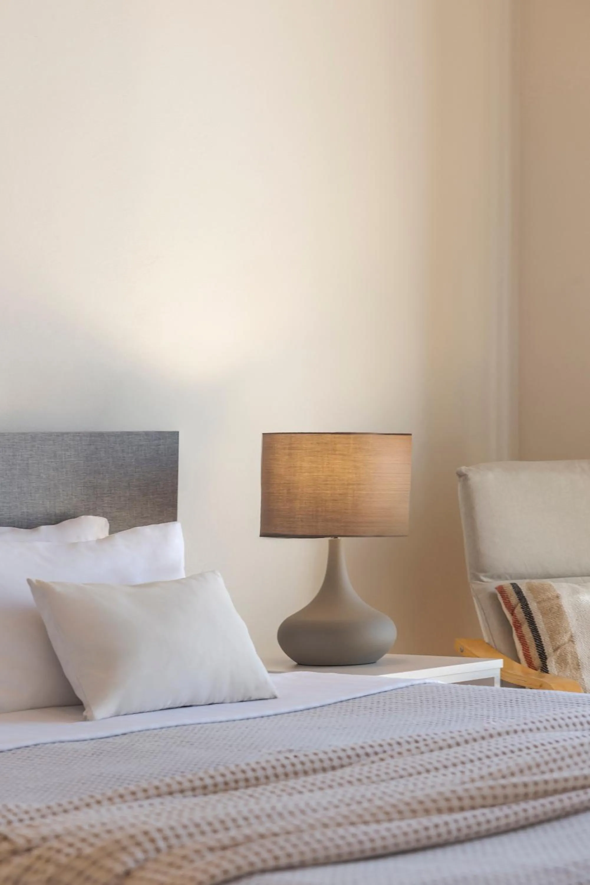 Bed in Magganos Sunset Villas