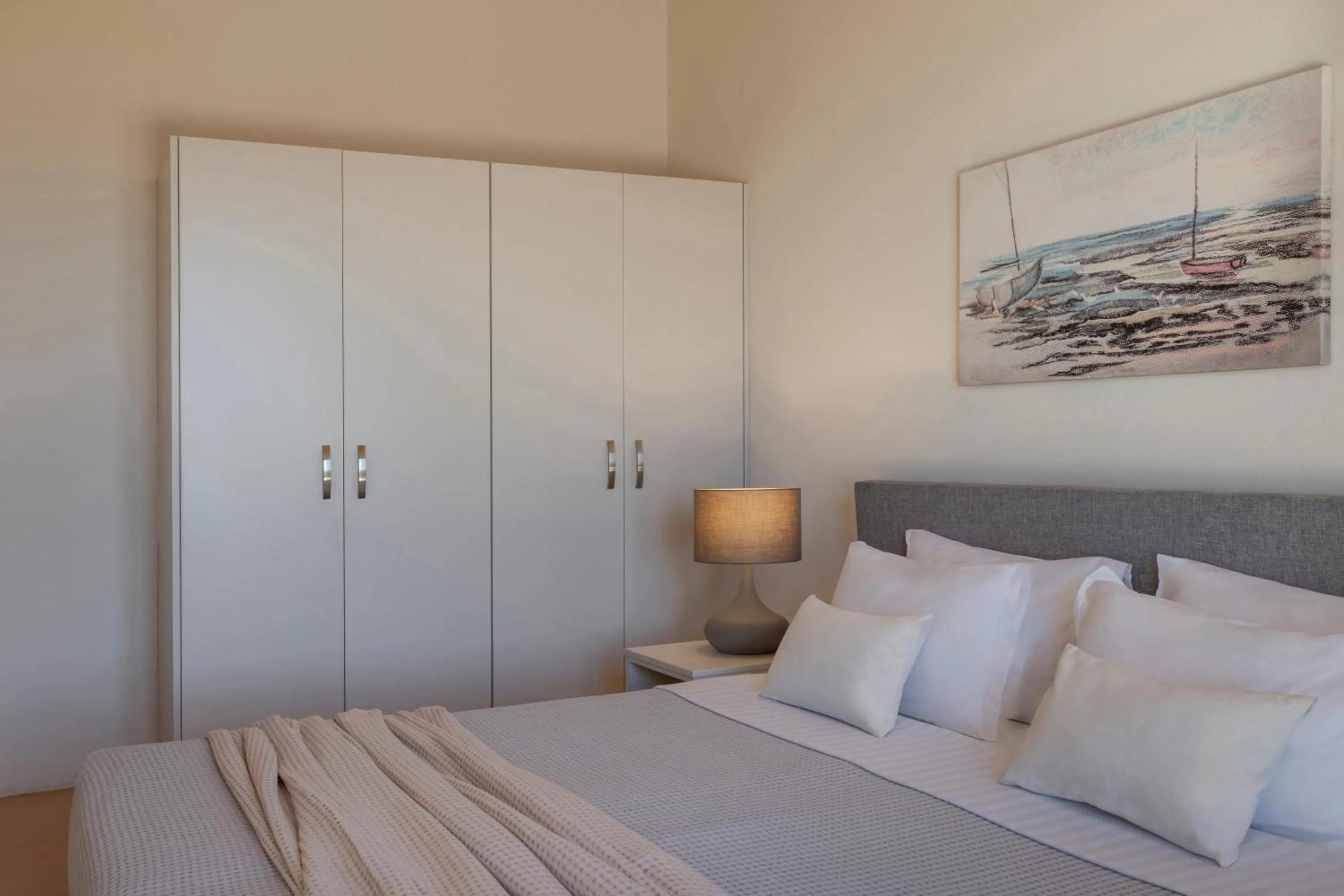 Bed in Magganos Sunset Villas