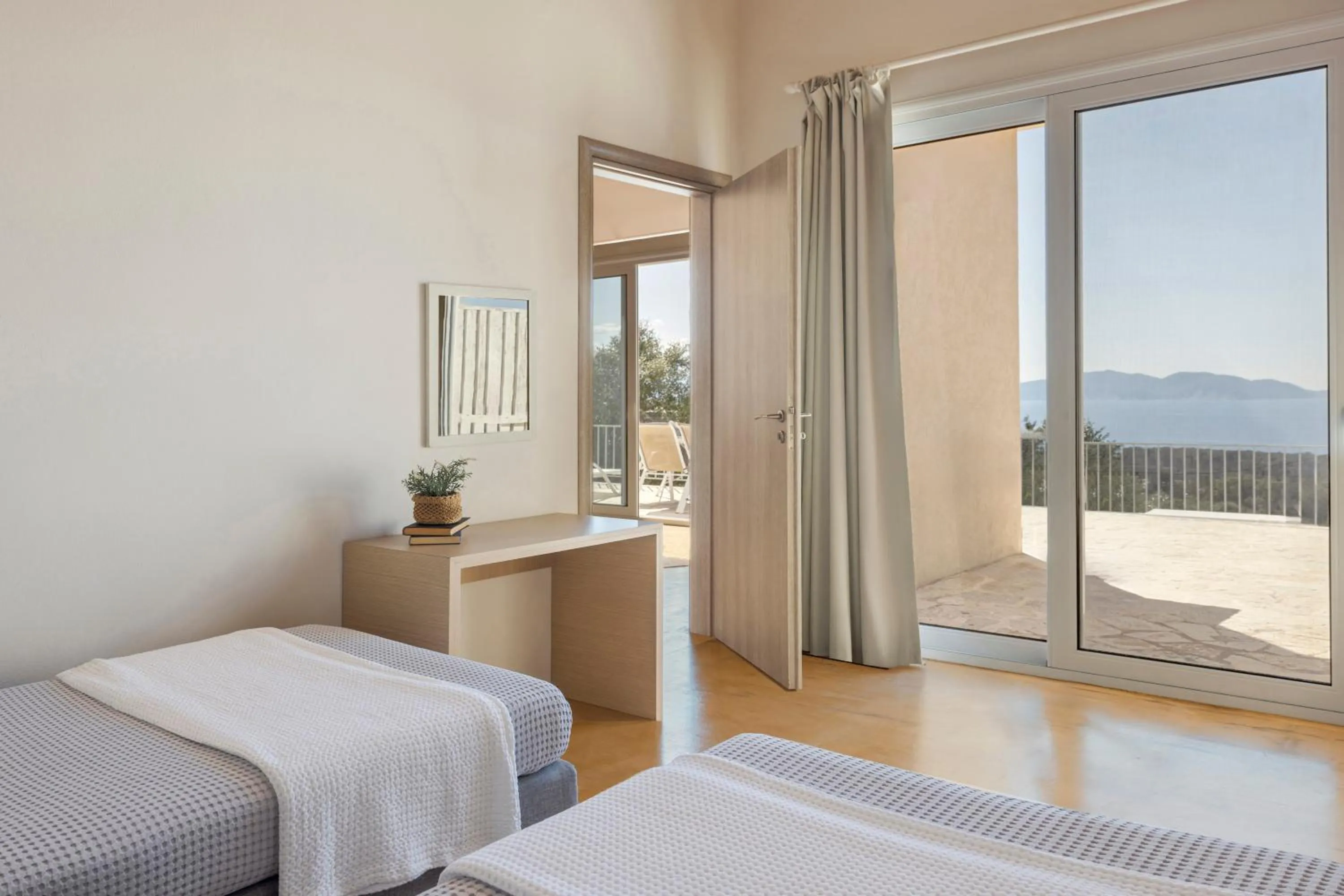 Bed in Magganos Sunset Villas