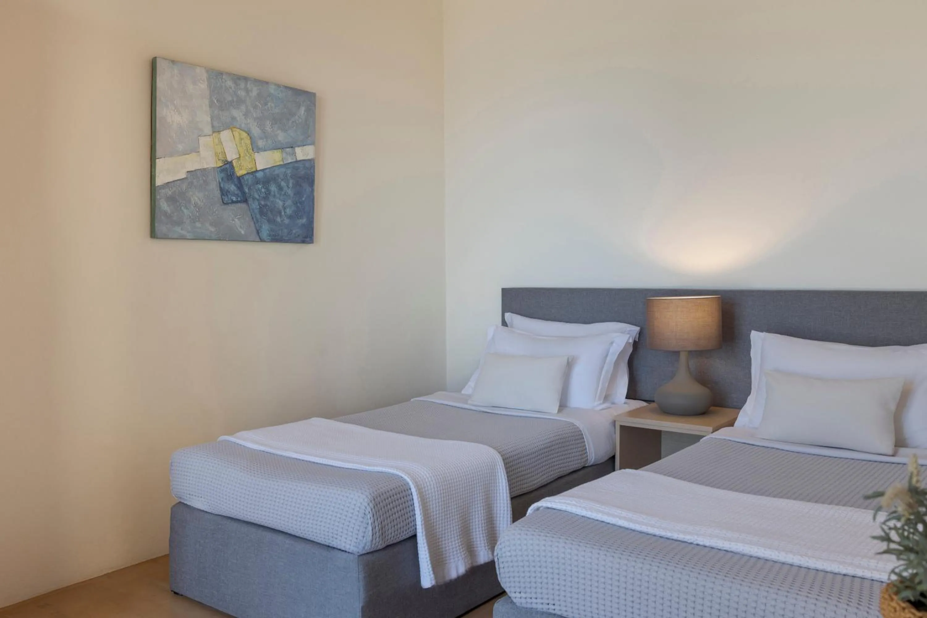 Bed in Magganos Sunset Villas