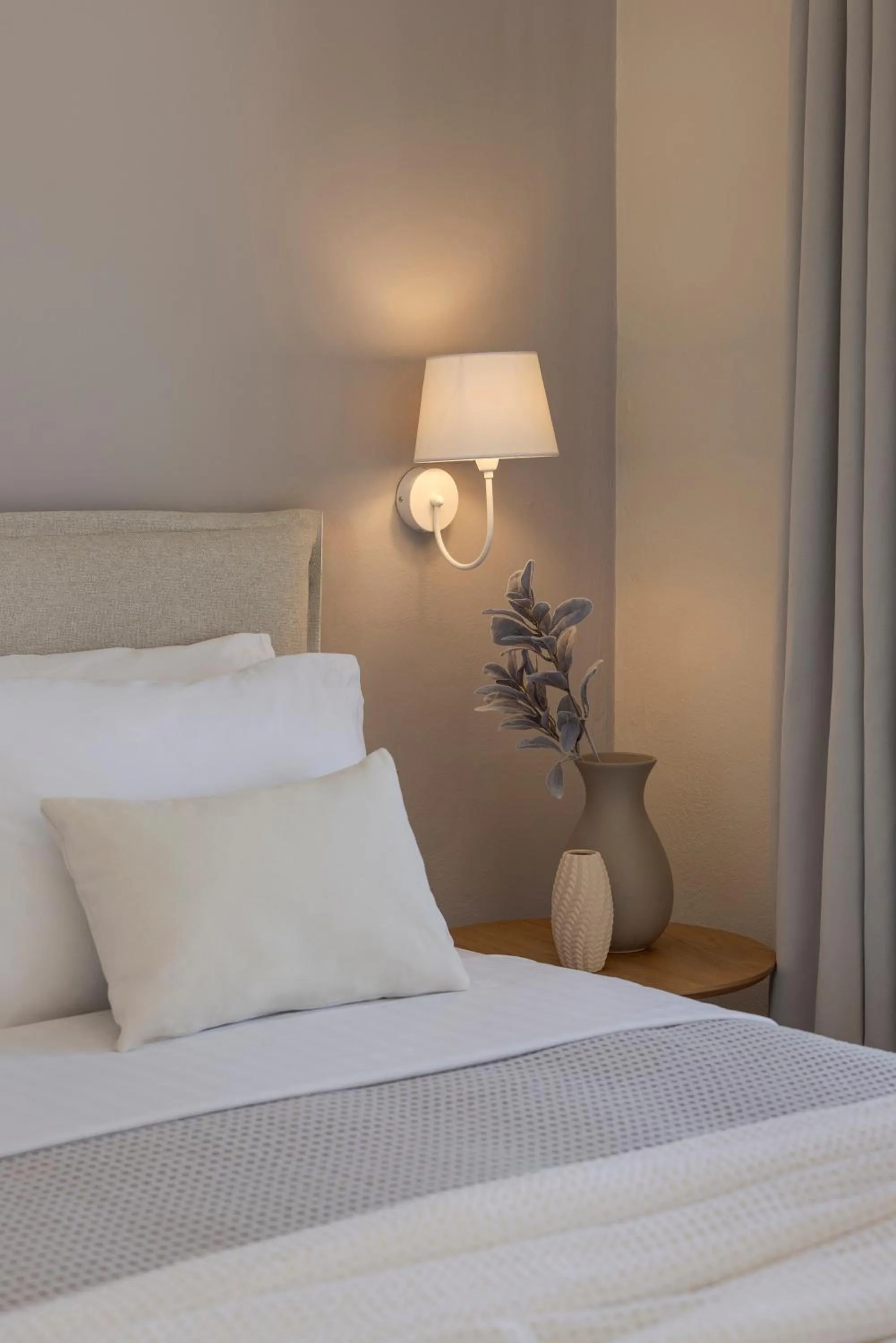 Bed in Magganos Sunset Villas