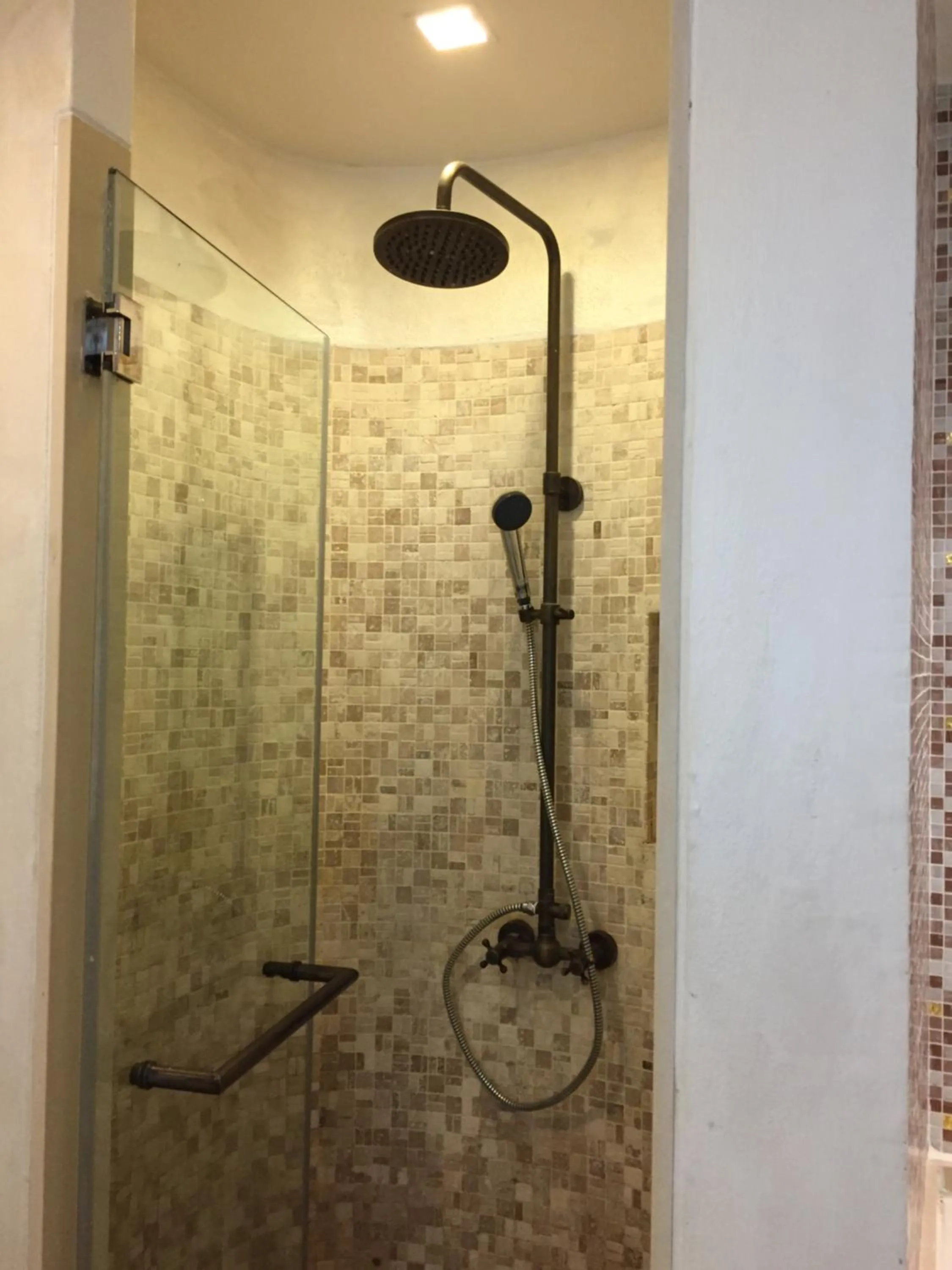 Bathroom in The Chelona pool access by Away