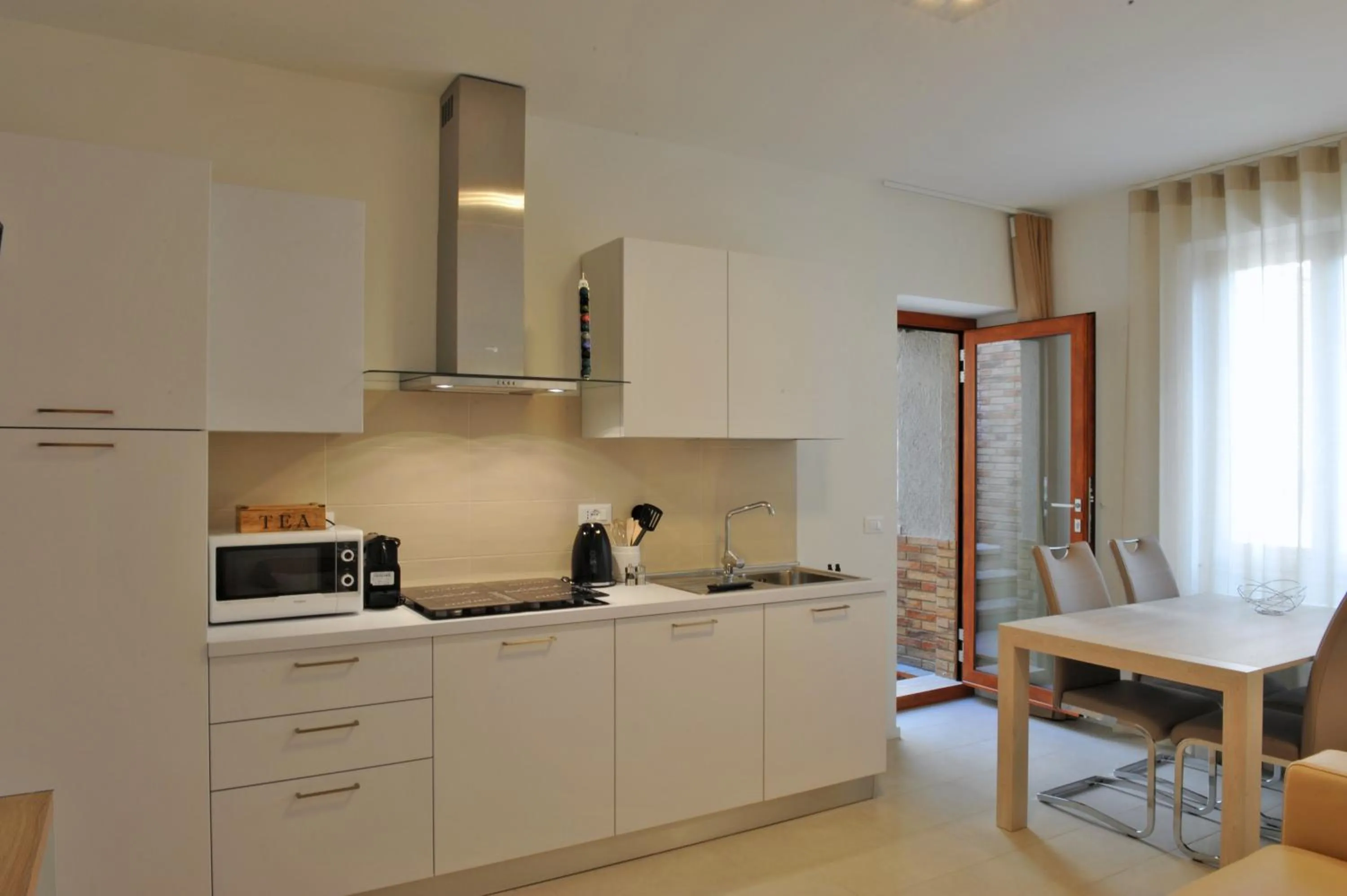 Kitchen or kitchenette in Bella Vacanza Limone
