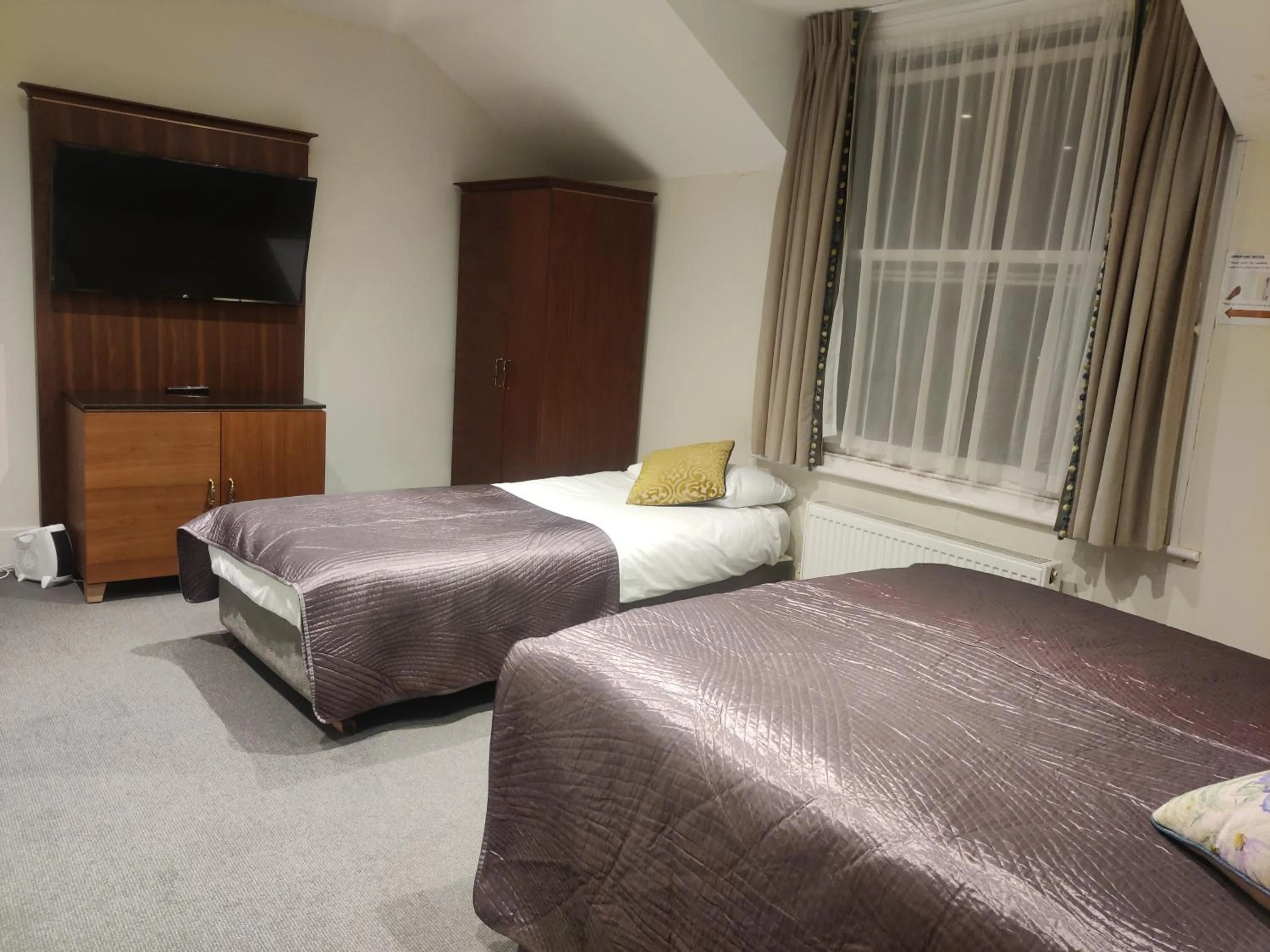 Decorative detail, Bed in Blue Bells Hotel