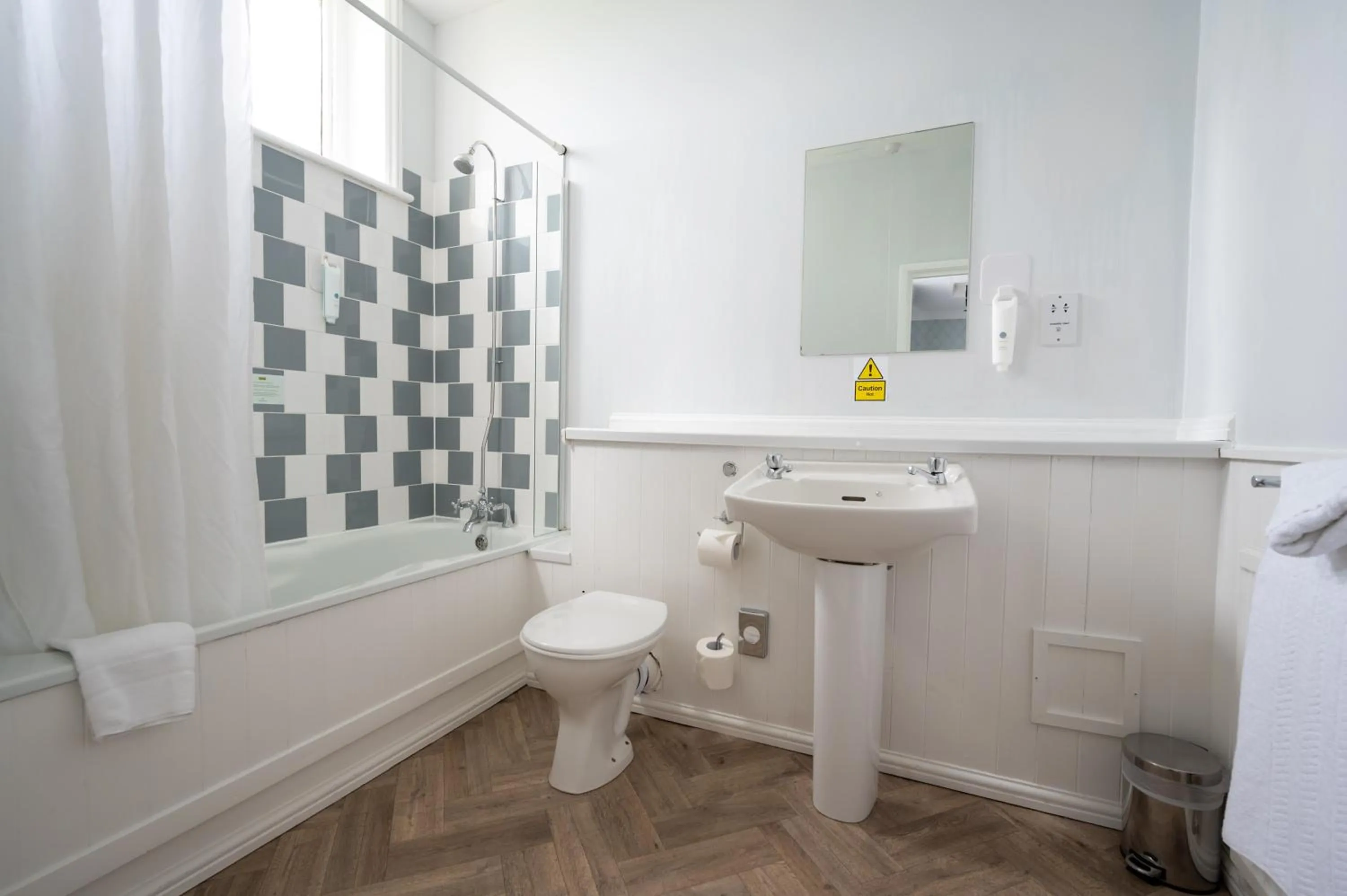 Bathroom in Rising Sun Hotel by Greene King Inns