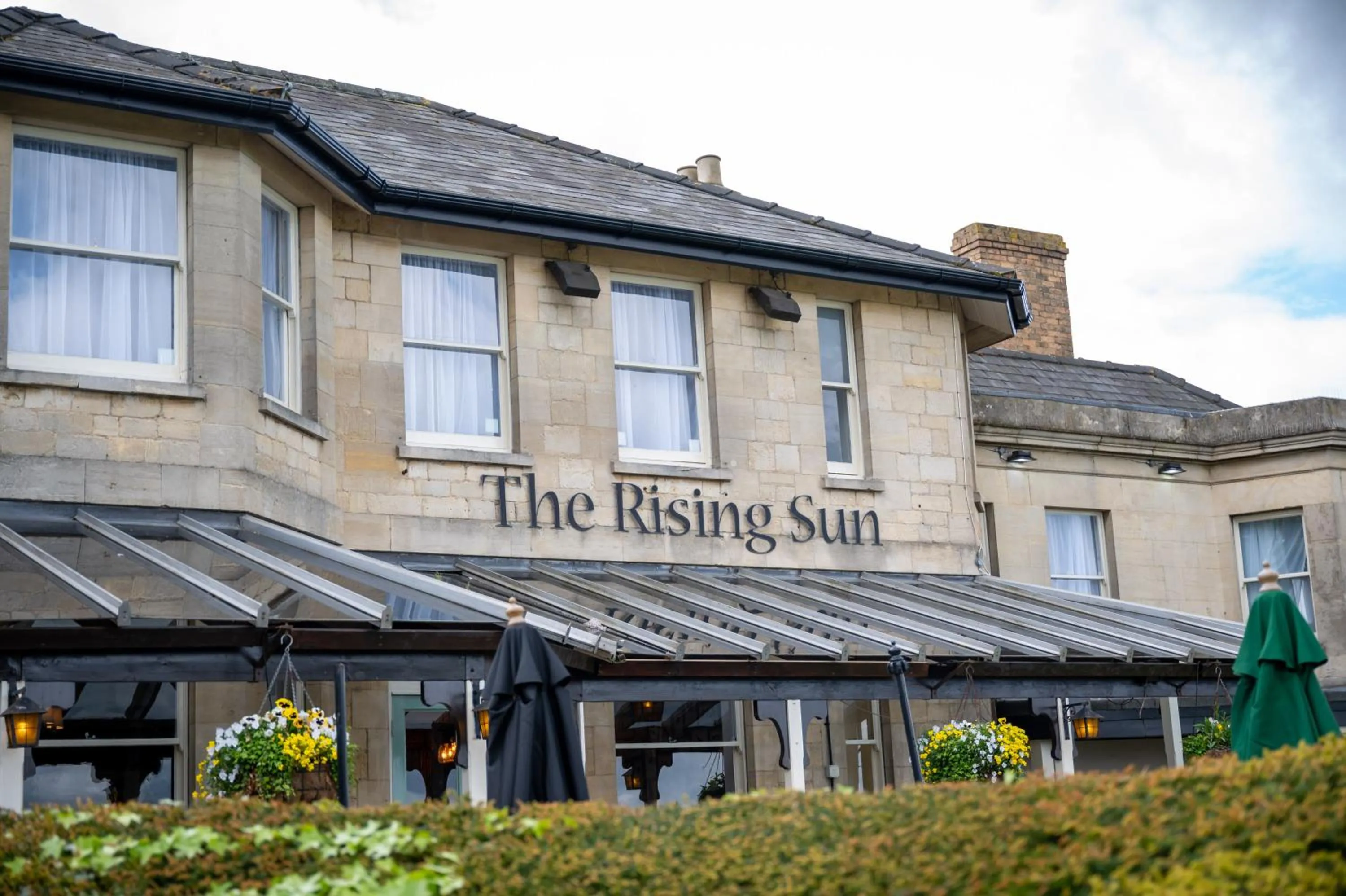 Facade/entrance in Rising Sun Hotel by Greene King Inns