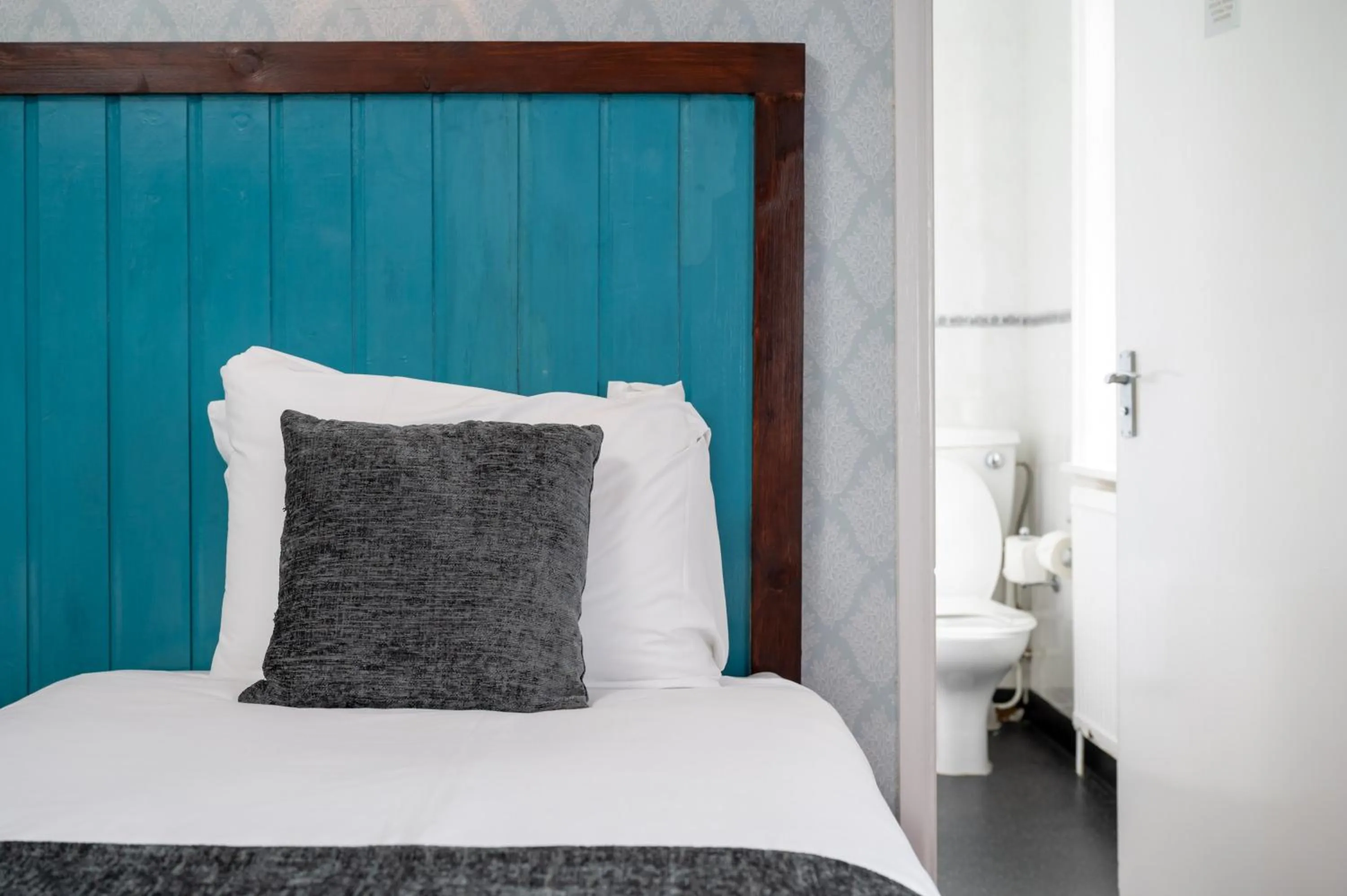 Bed in Rising Sun Hotel by Greene King Inns