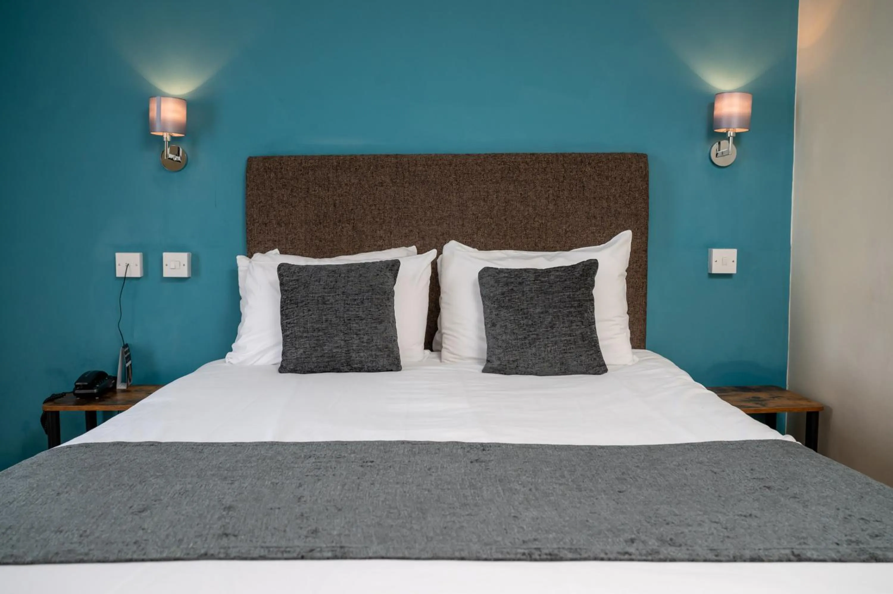 Bed in Rising Sun Hotel by Greene King Inns