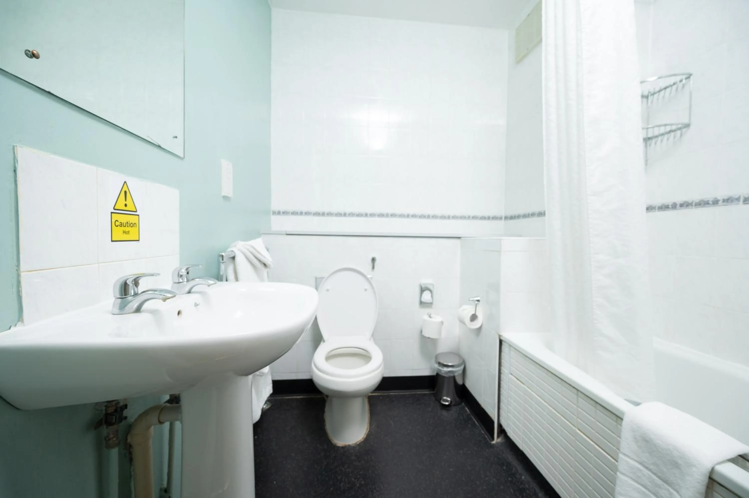 Bathroom in Rising Sun Hotel by Greene King Inns