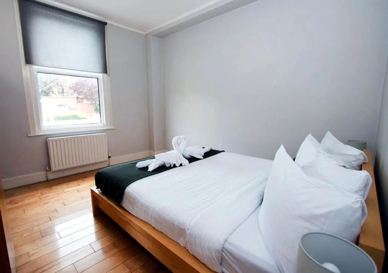 Bed in Westciti Caroco Aparthotel