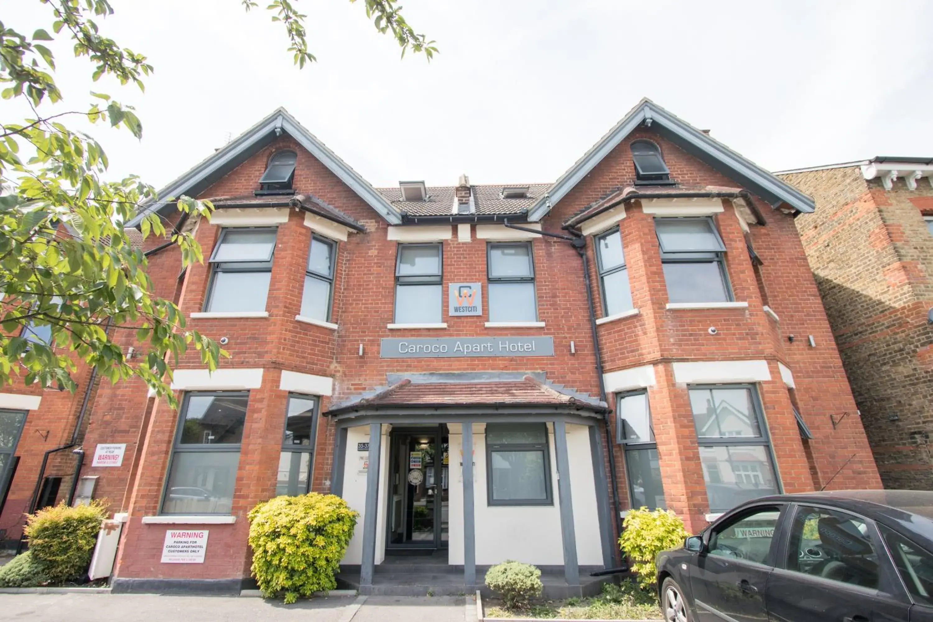 Property building in Westciti Caroco Aparthotel Property building in Westciti Caroco Aparthotel