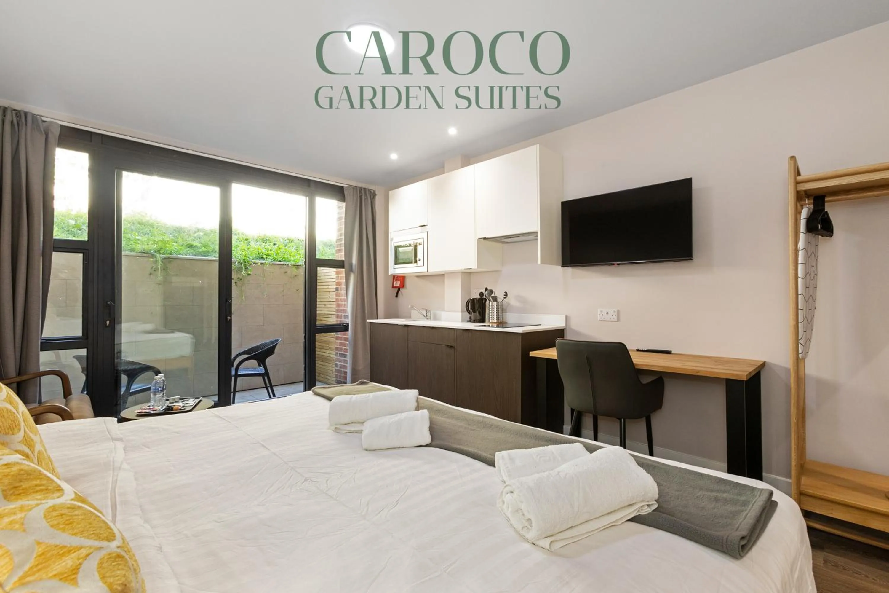 Bed in Westciti Caroco Aparthotel