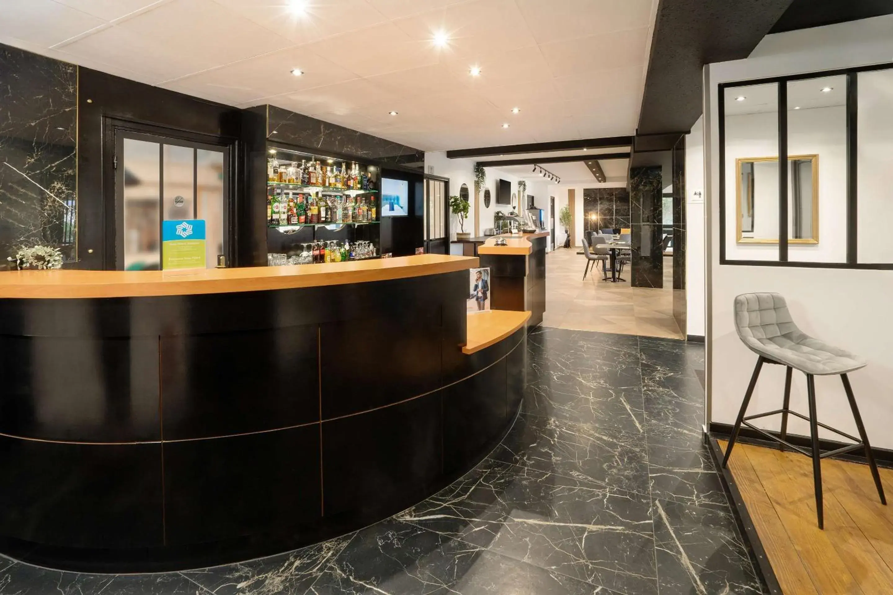 Lobby or reception in Sure Hotel by Best Western Rouvignies Valenciennes Lobby or reception in Sure Hotel by Best Western Rouvignies Valenciennes