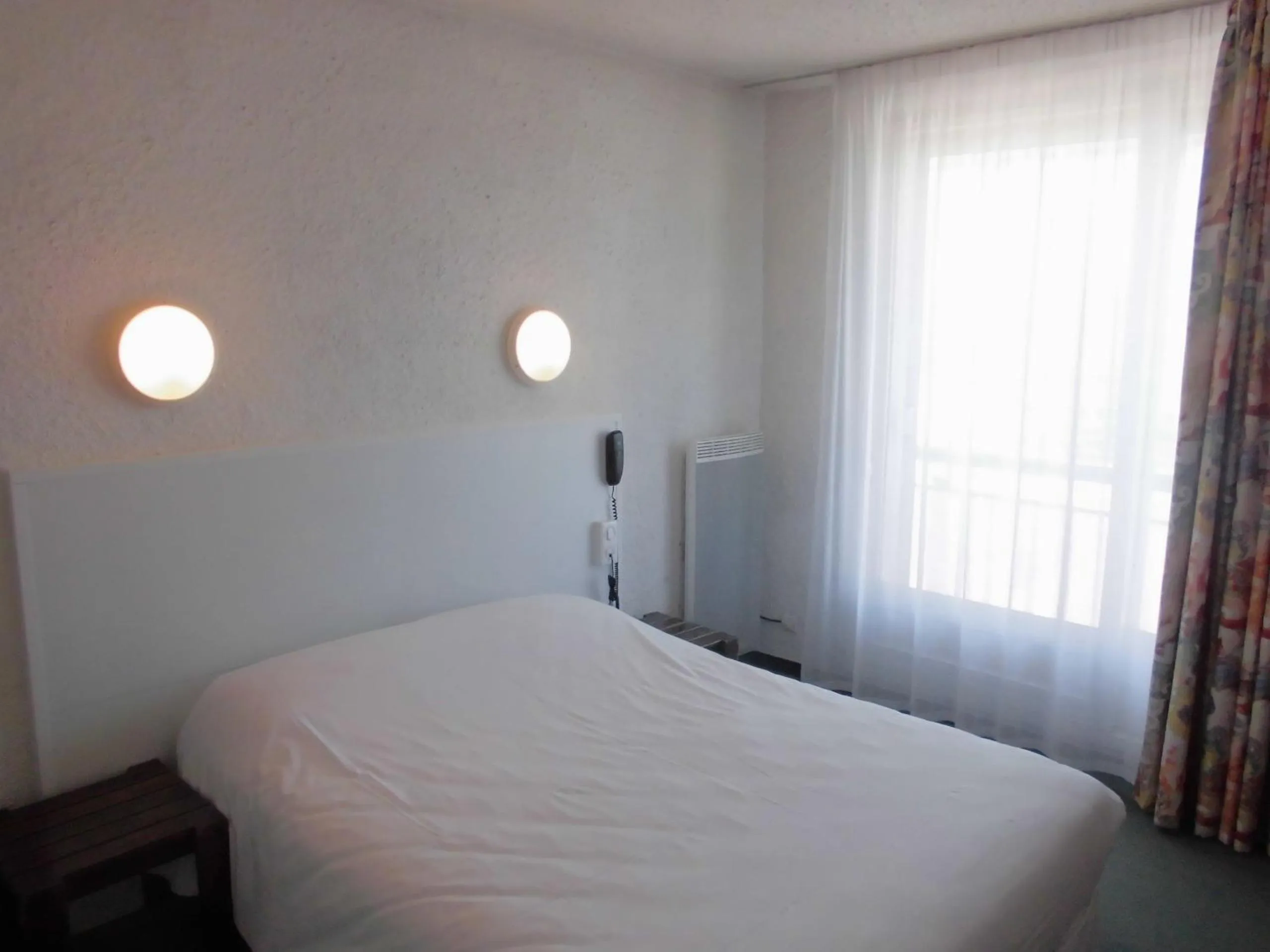 Bed in Cit'Hotel Le Challans