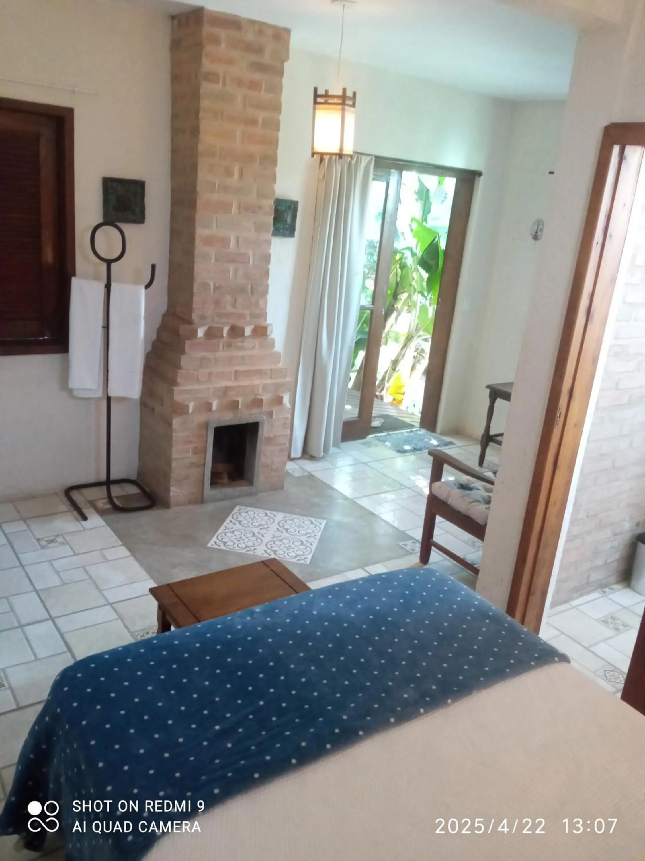 Bed in Pousada Refúgio dos Pássaros