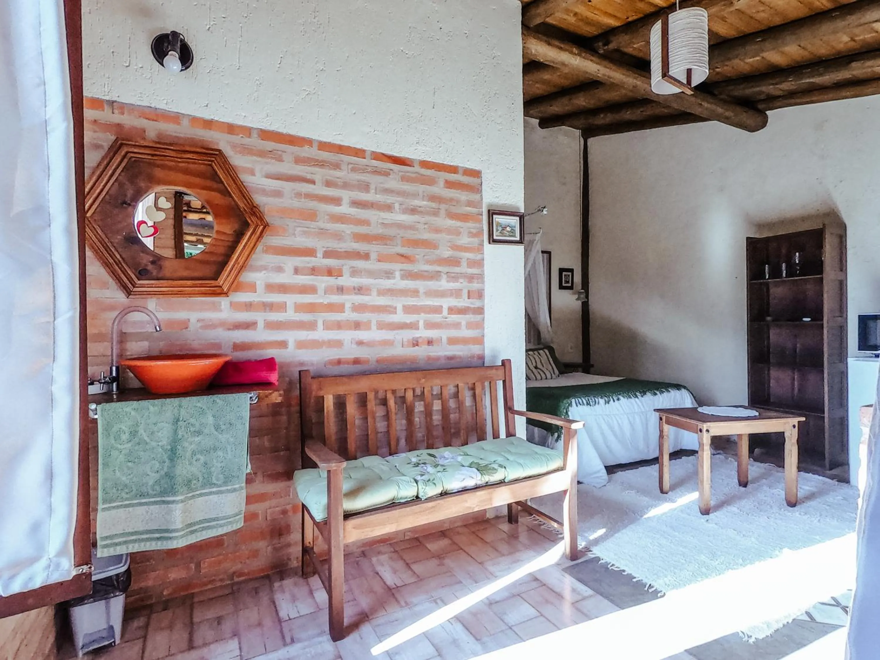Living room in Pousada Refúgio dos Pássaros
