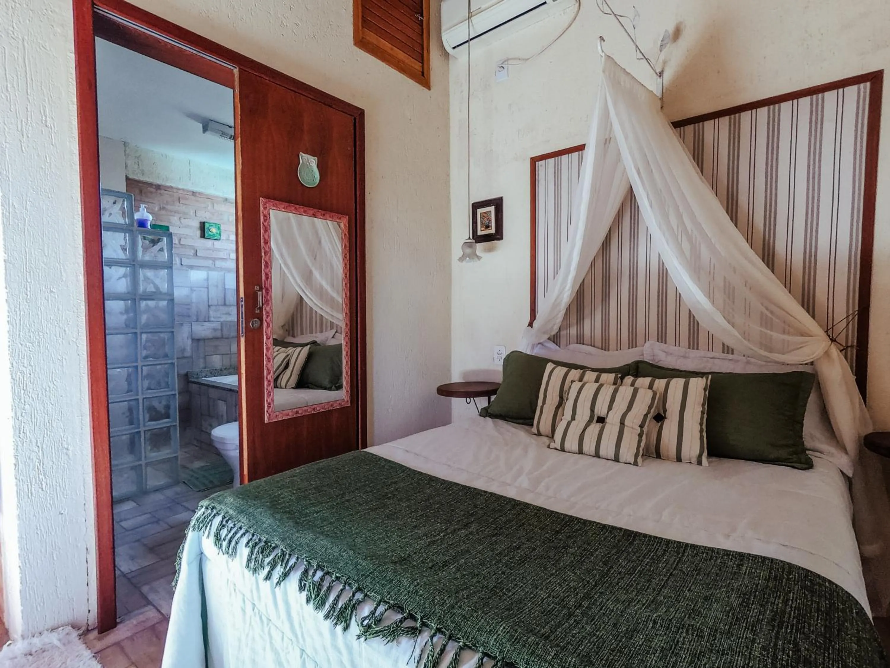 Bed in Pousada Refúgio dos Pássaros