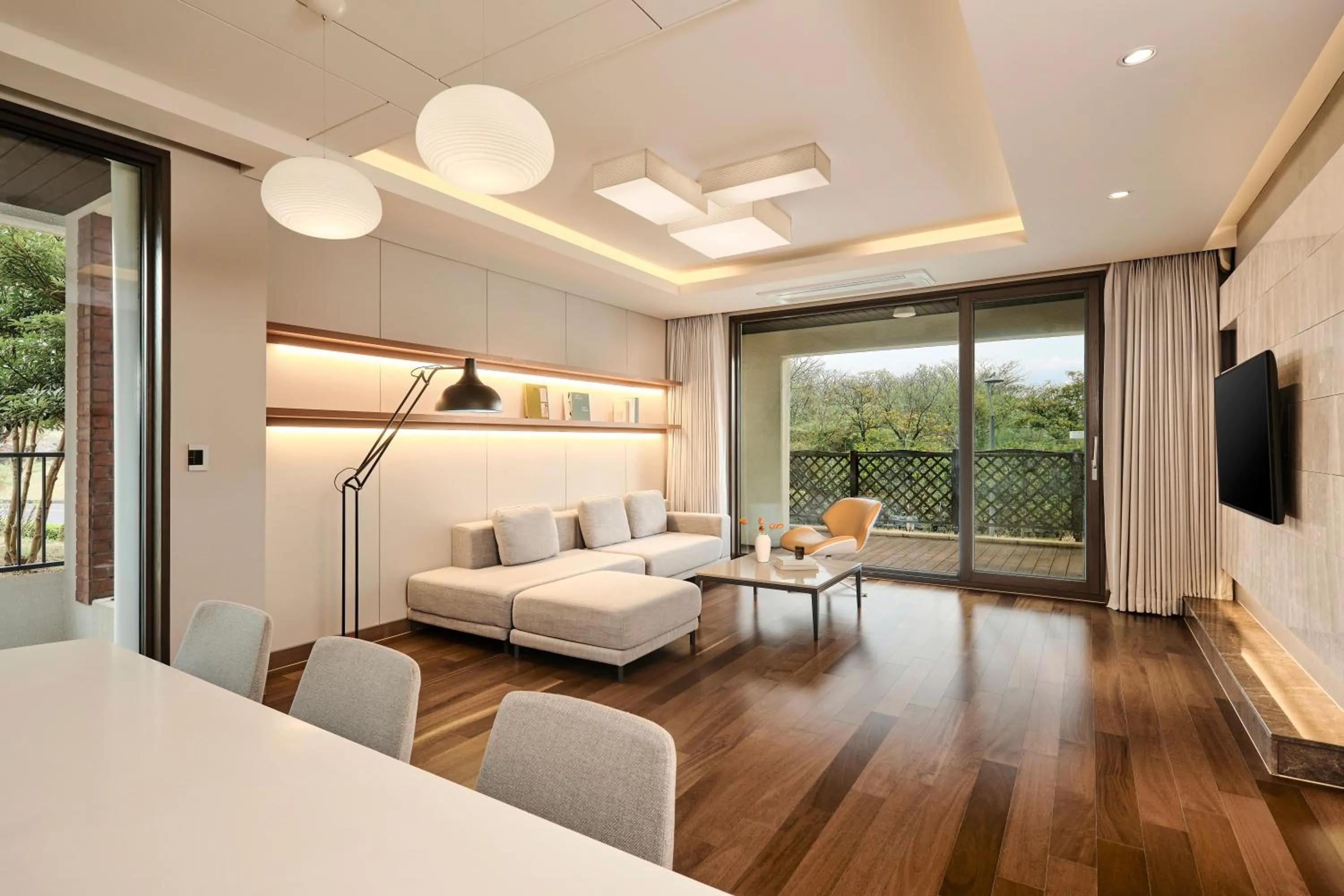 Living room, Bed in Somerset Jeju Shinhwa World