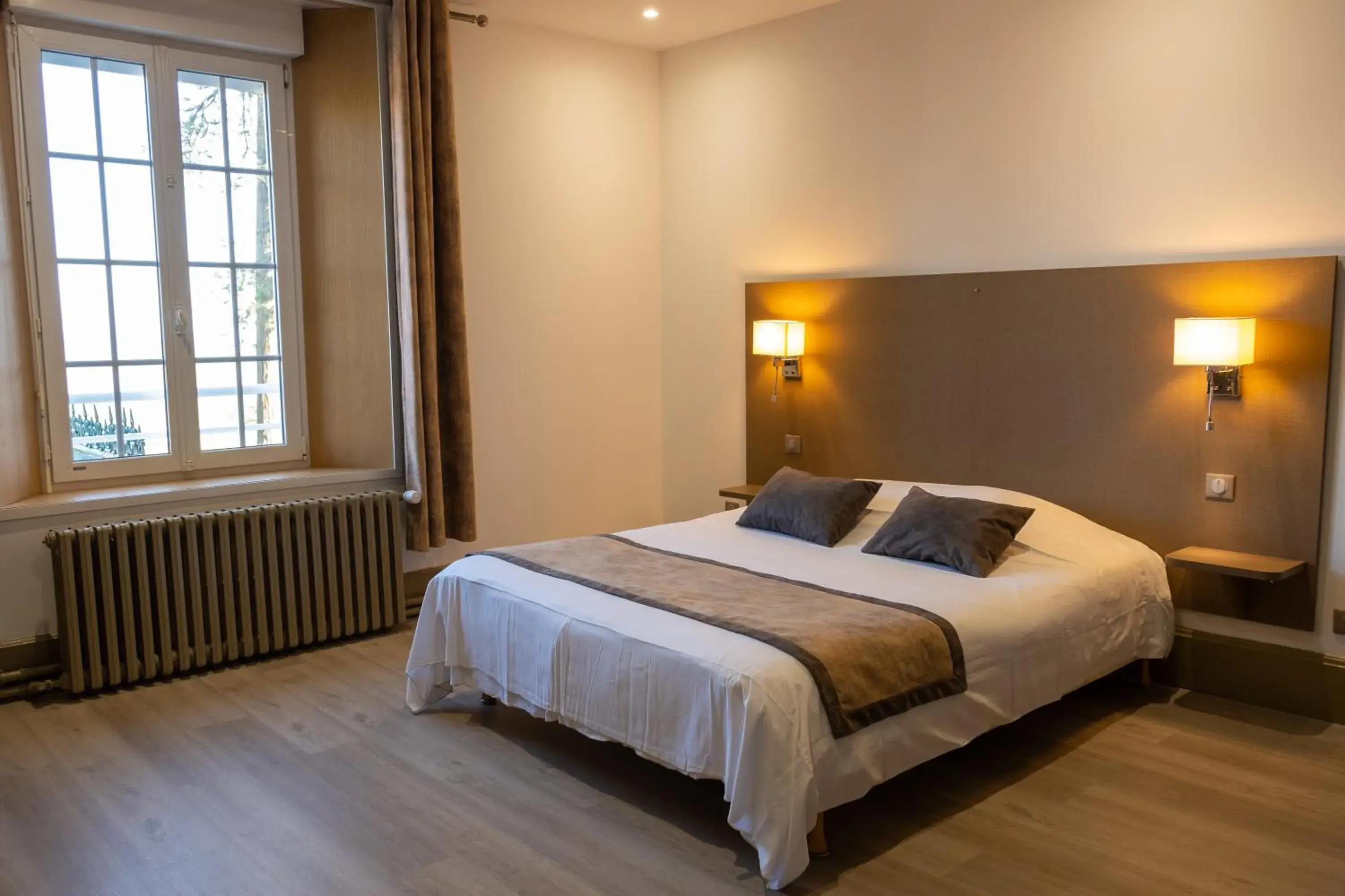 Property building, Bed in Logis - Hotel Restaurant La Sapinière Property building, Bed in Logis - Hotel Restaurant La Sapinière