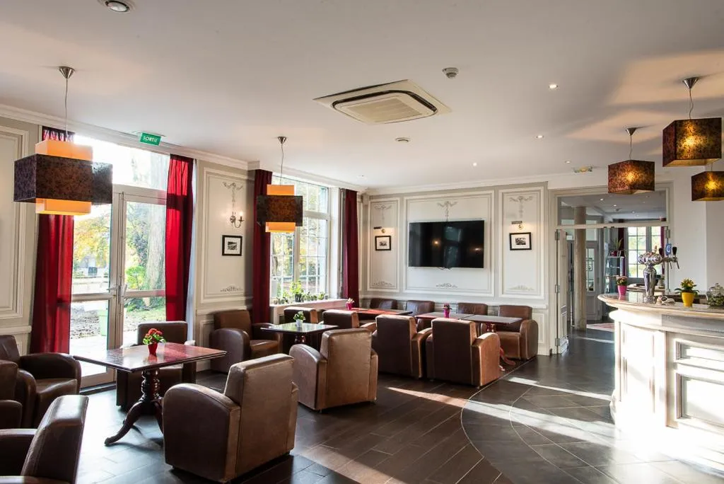 Living room in Logis - Hotel Restaurant La Sapinière