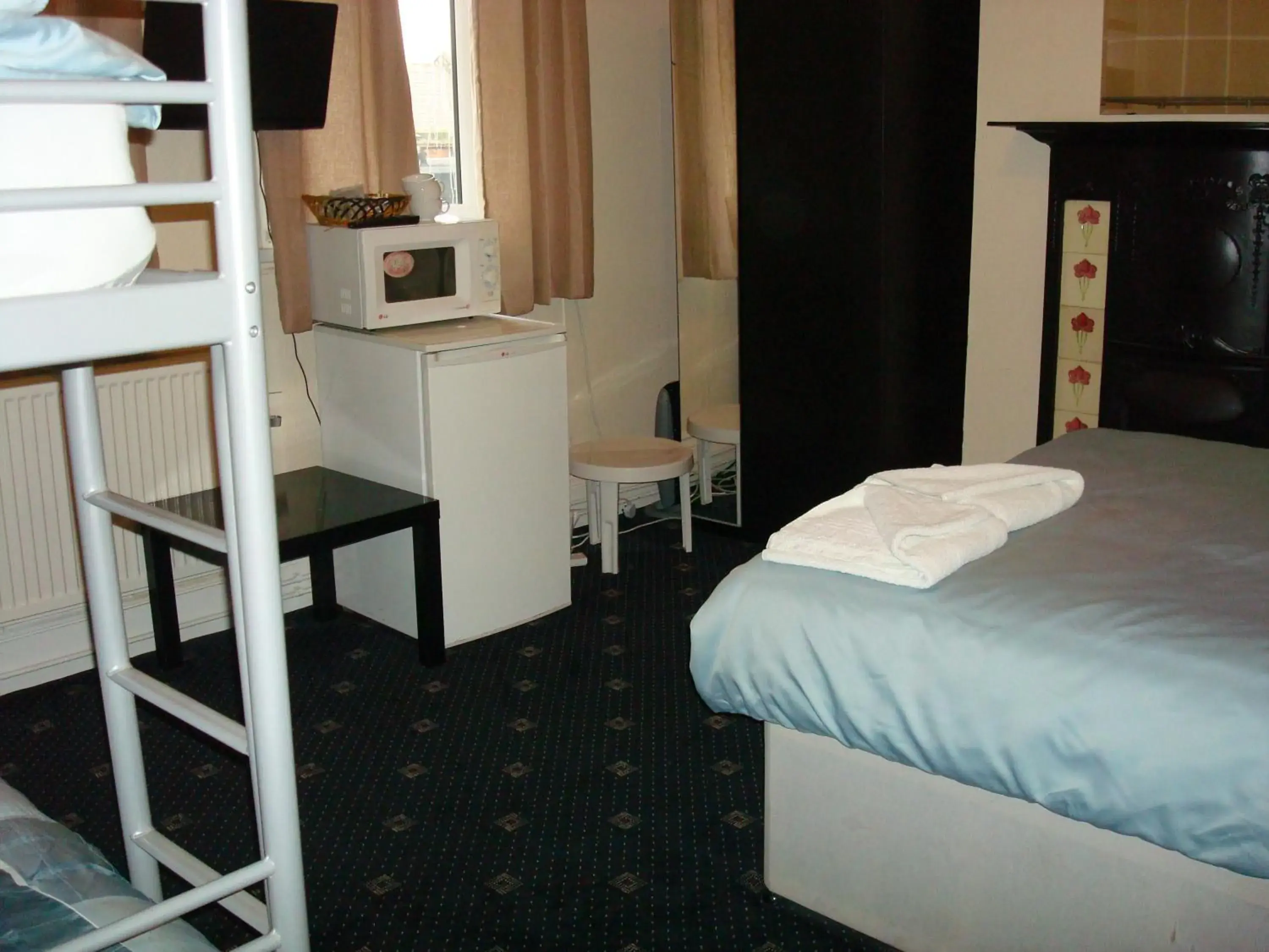 Bedroom, Bed in Forest Gate Hotel - Free Parking limited spaces Bedroom, Bed in Forest Gate Hotel - Free Parking limited spaces