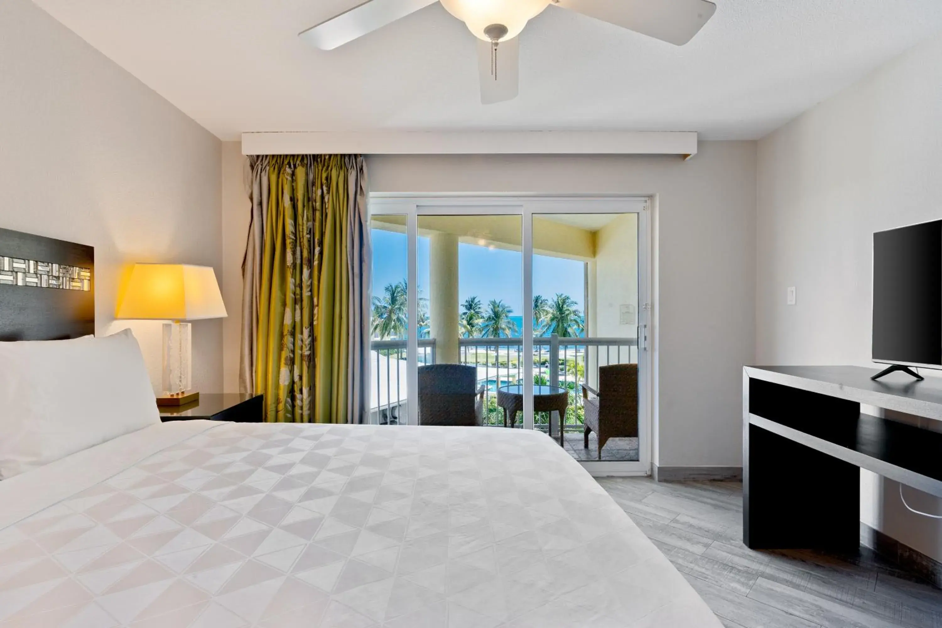 Bed in The Grand Caymanian Resort Bed in The Grand Caymanian Resort
