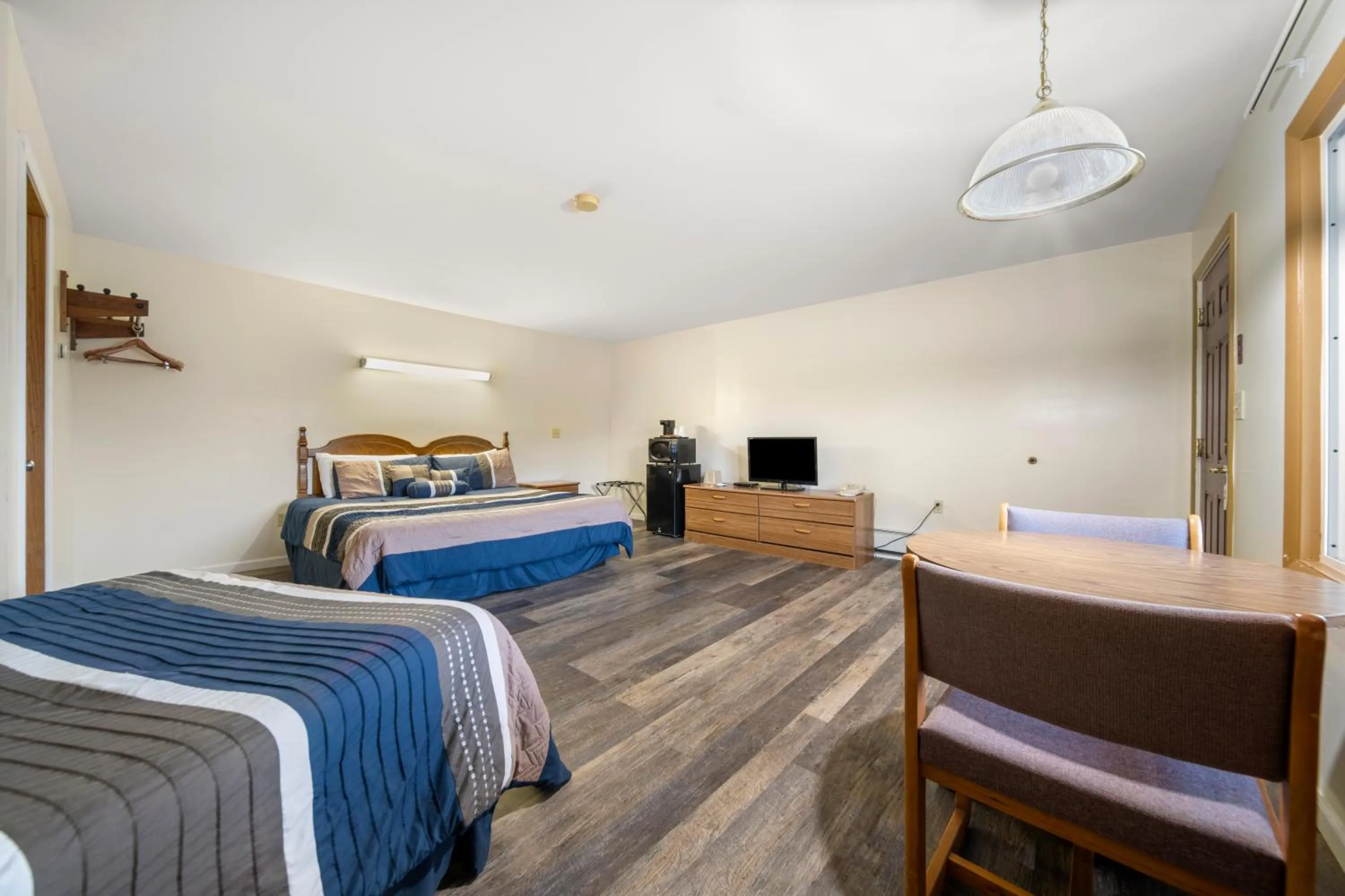 Bed in Thumb Heritage Inn