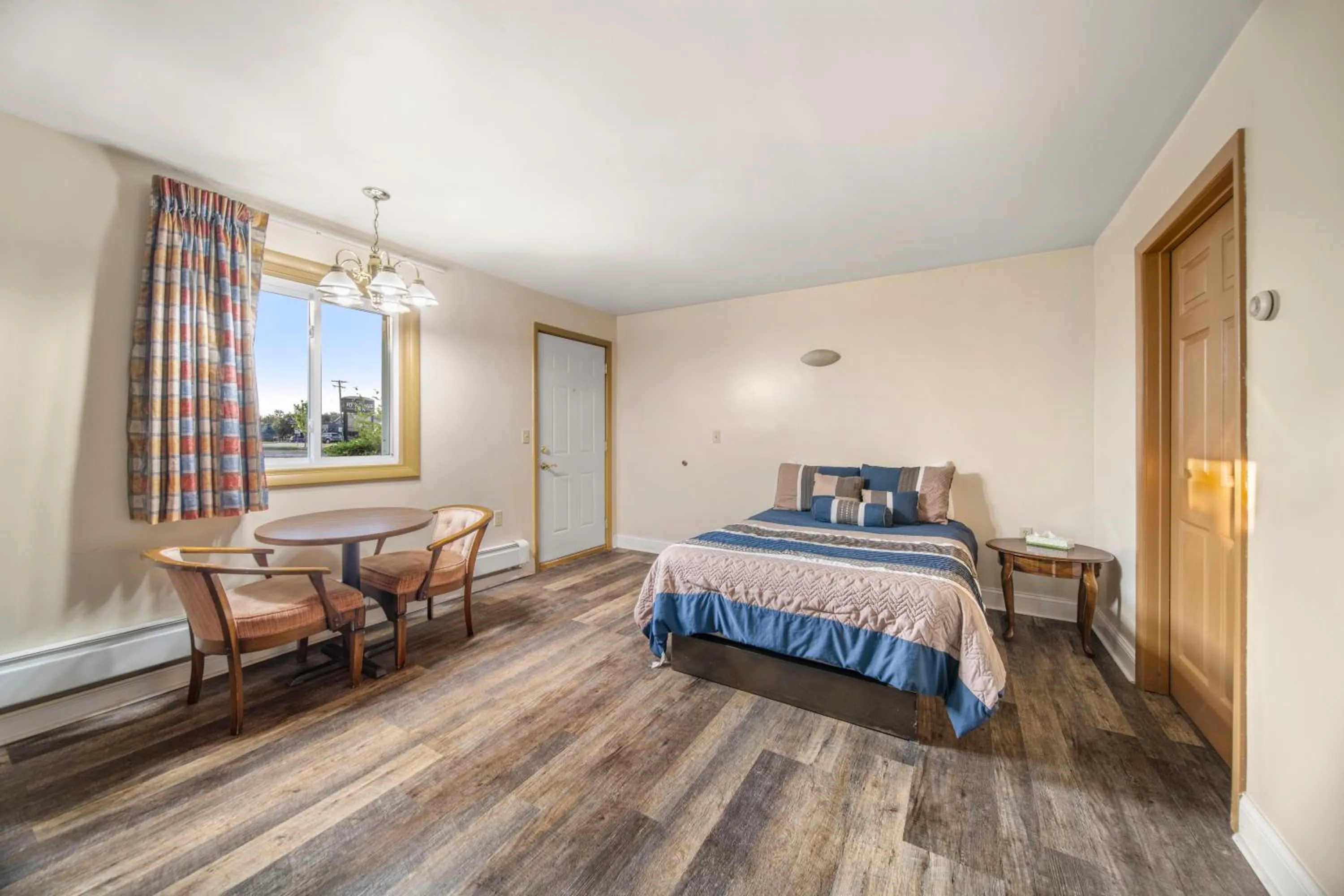 Bed in Thumb Heritage Inn