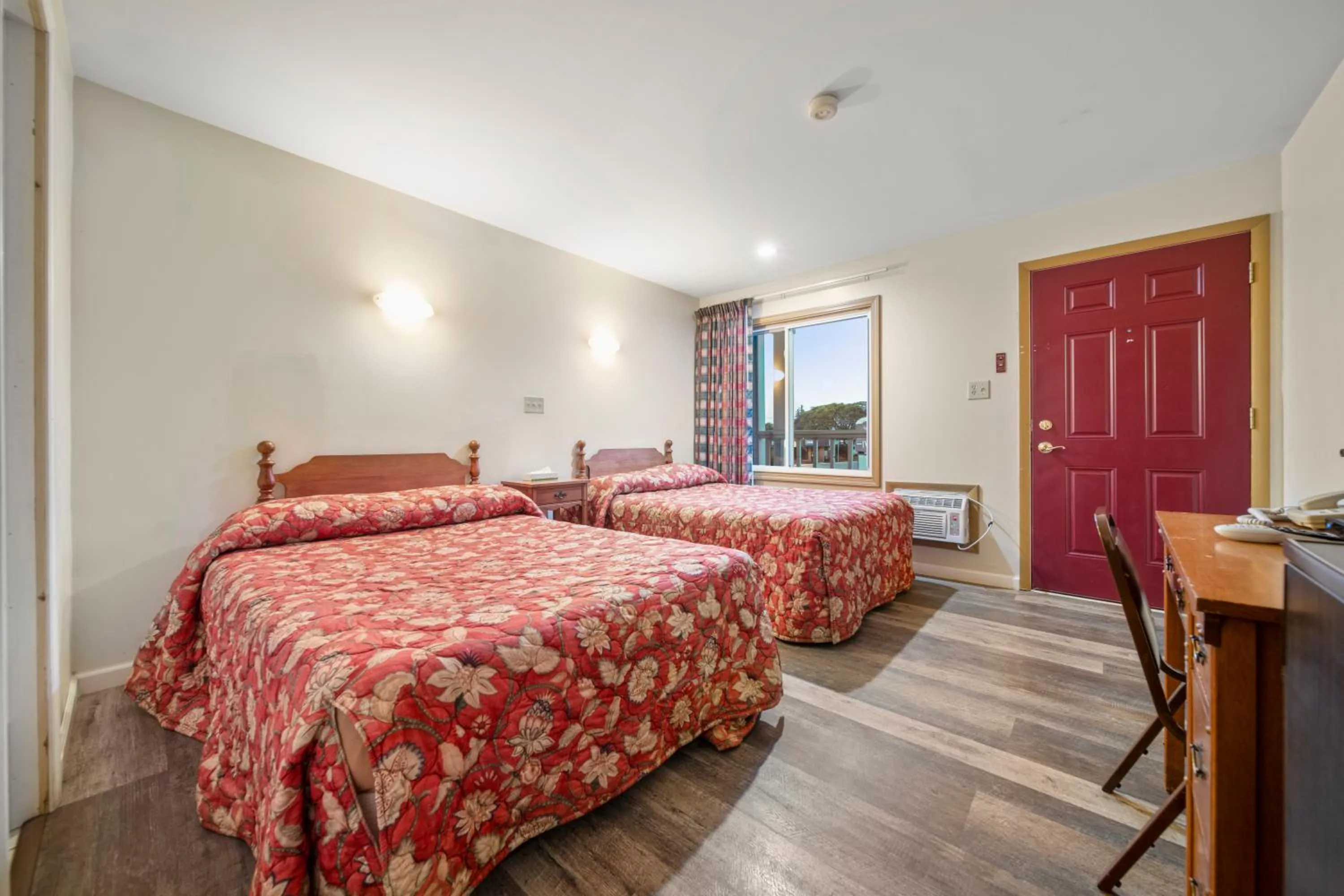 Bed in Thumb Heritage Inn