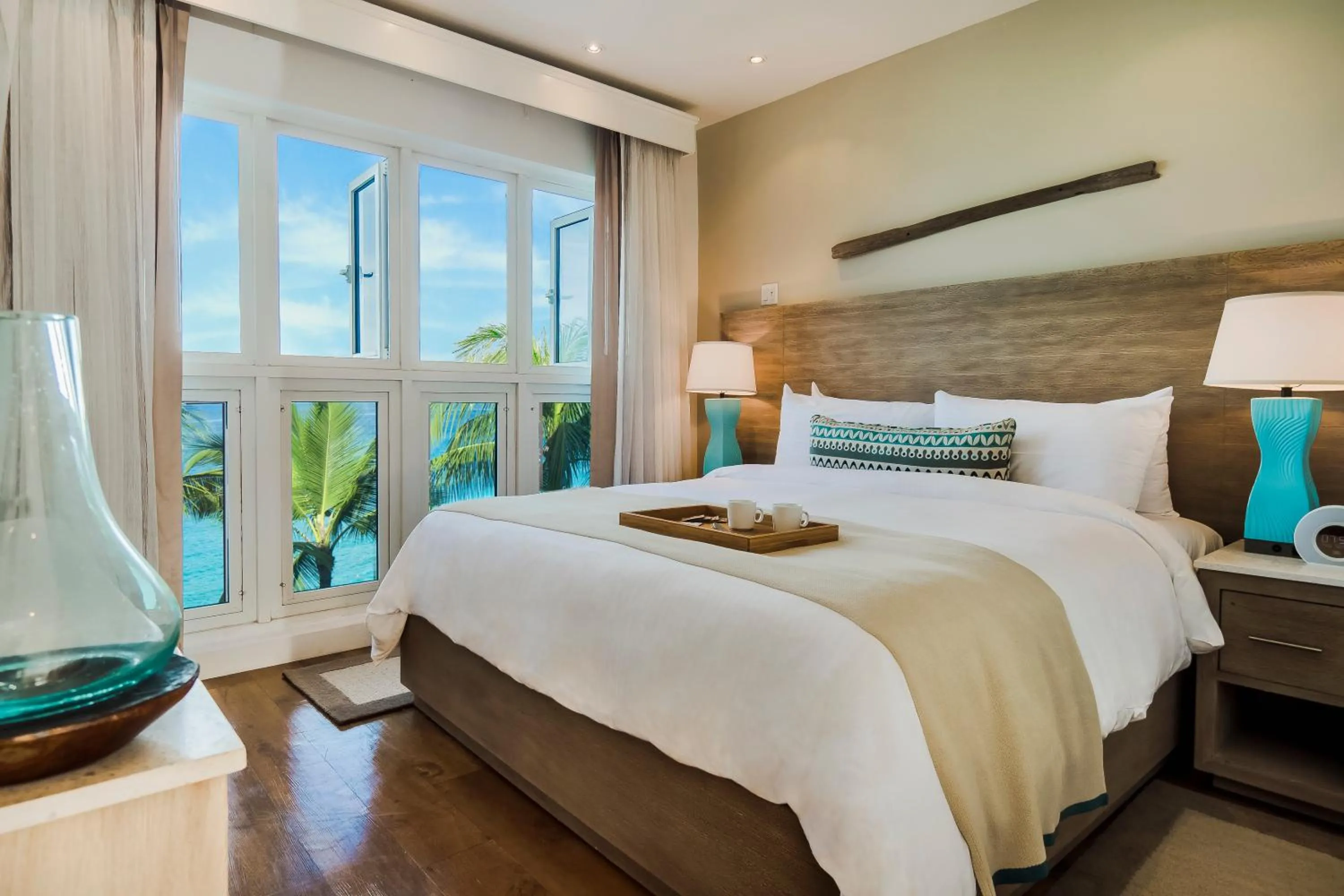 Bed in Waves Resort & Spa, Barbados, An Autograph Collection All-Inclusive Resort