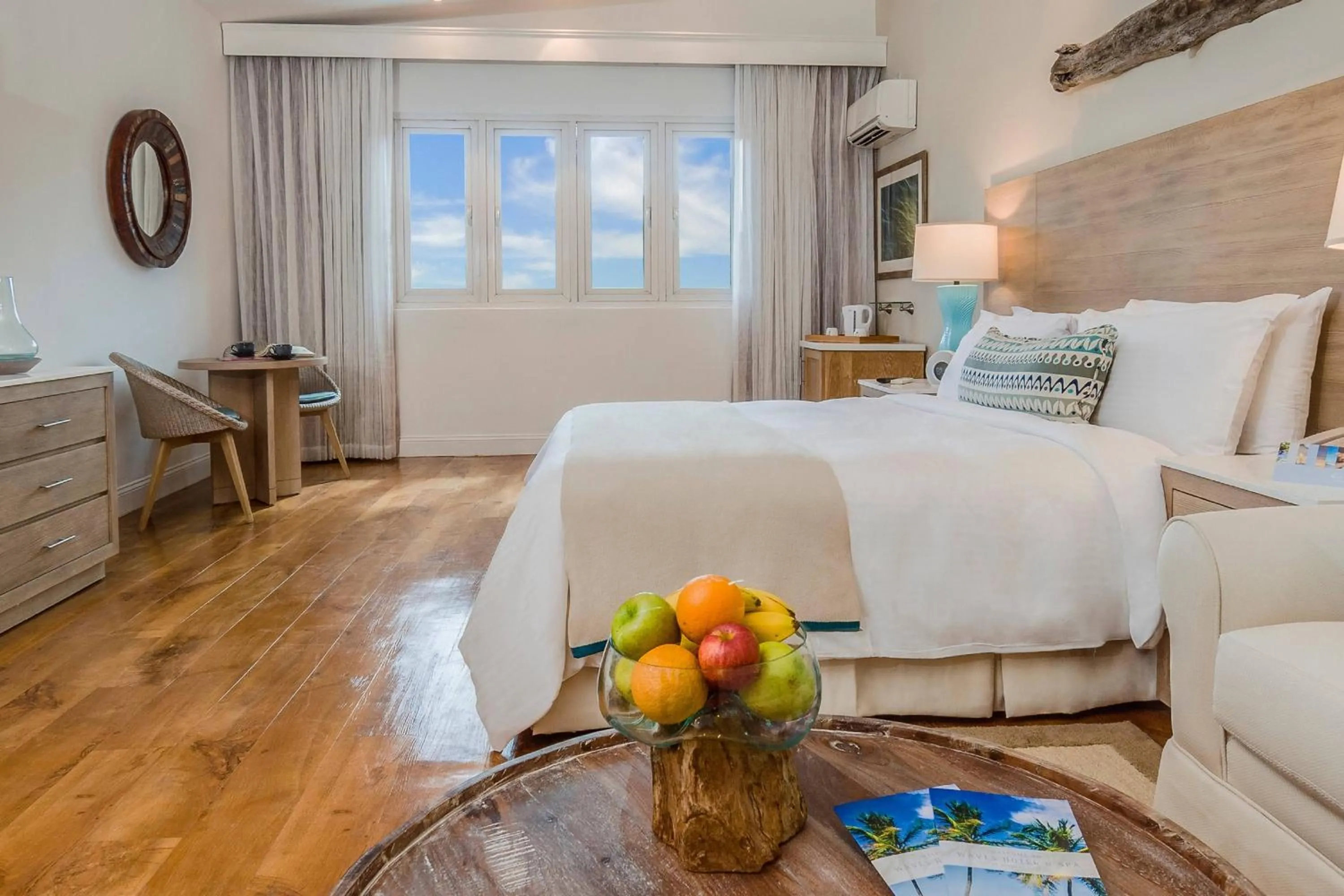 Photo of the whole room, Bed in Waves Resort & Spa, Barbados, An Autograph Collection All-Inclusive Resort