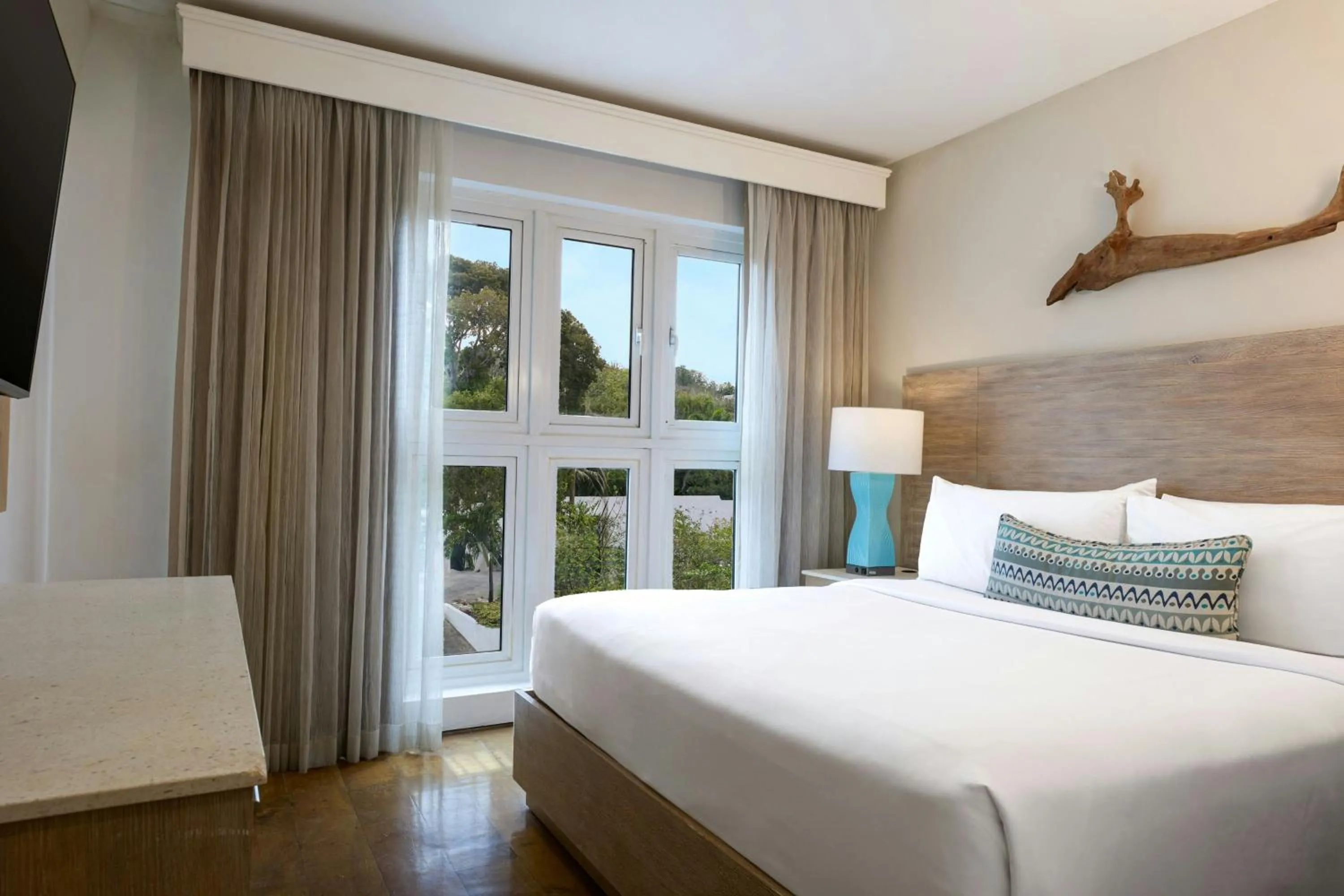 Photo of the whole room, Bed in Waves Resort & Spa, Barbados, An Autograph Collection All-Inclusive Resort