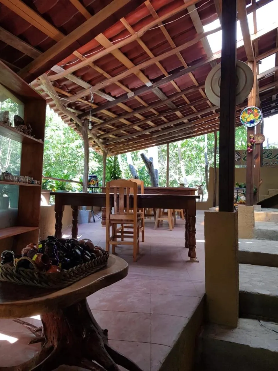 Communal lounge/ TV room in El Eden Bungalows