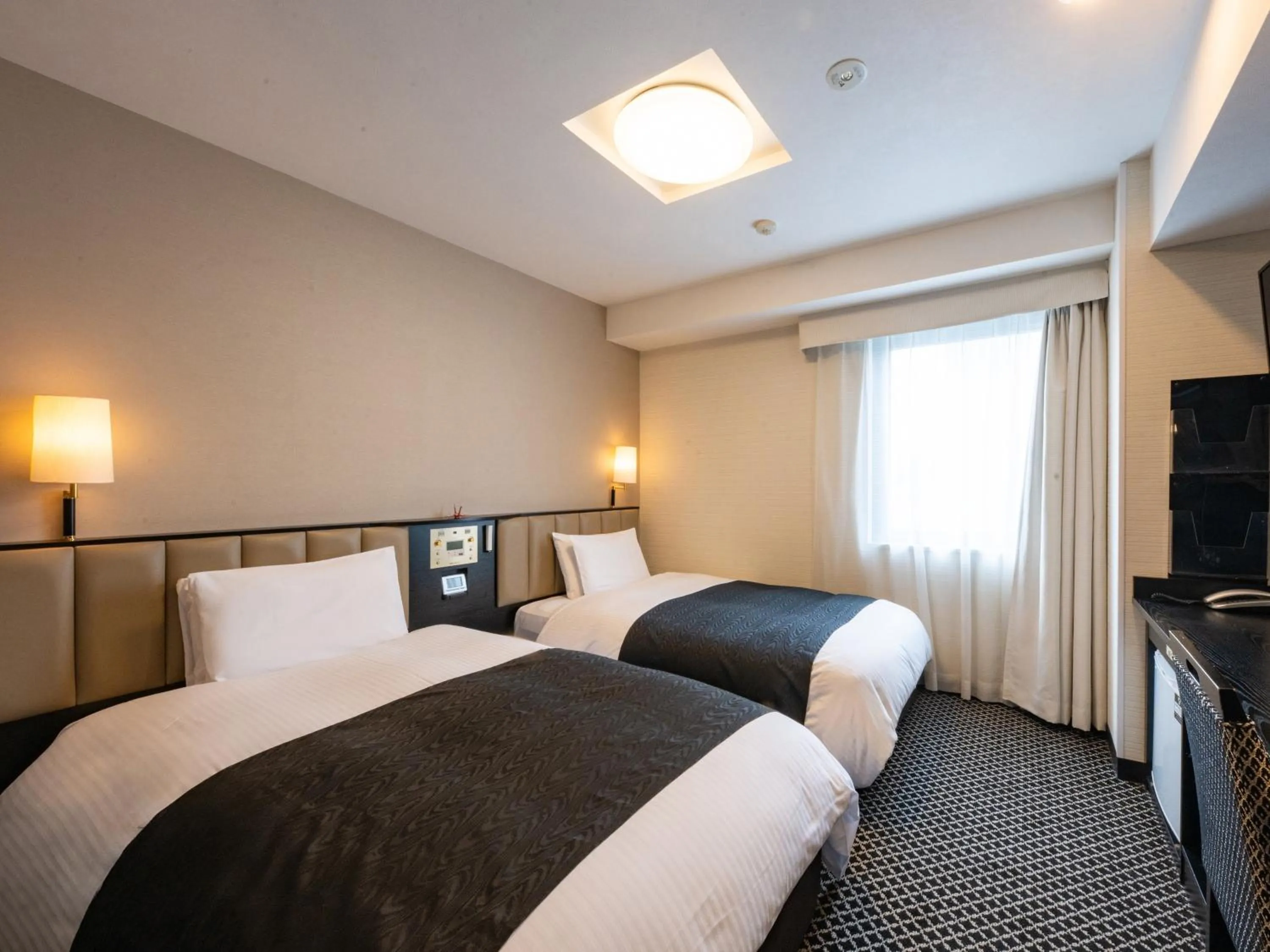 Bed in APA Hotel Nagoya Sakae Higashi